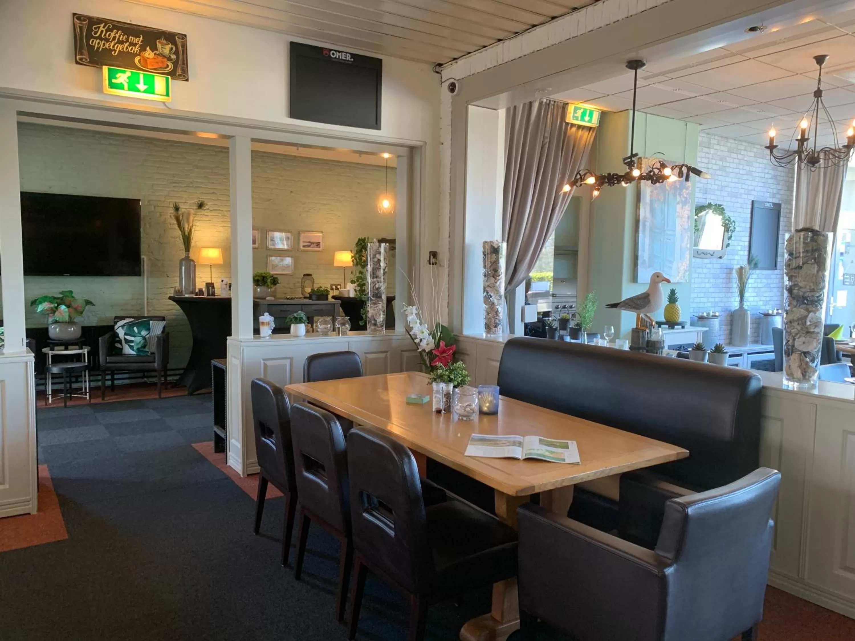 Communal lounge/ TV room in HCR de Schelphoek