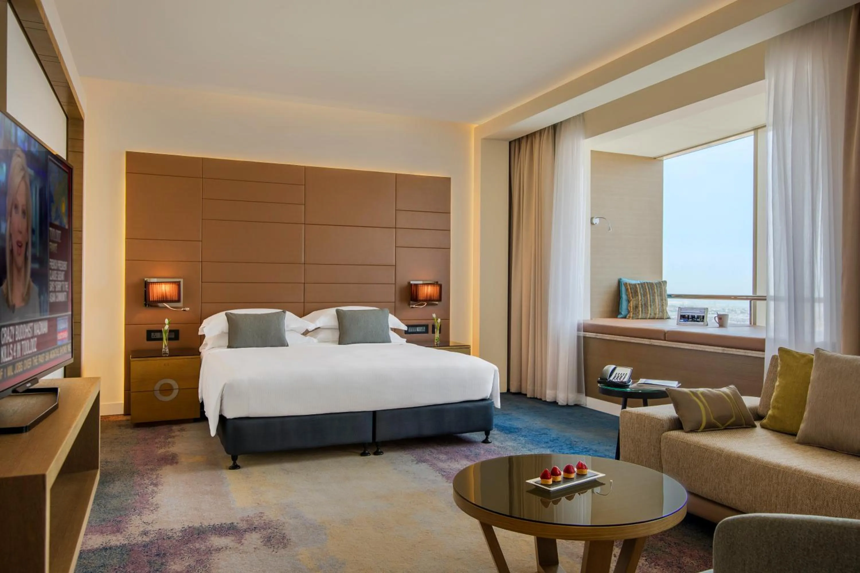 Seating area, Bed in Towers Rotana - Dubai
