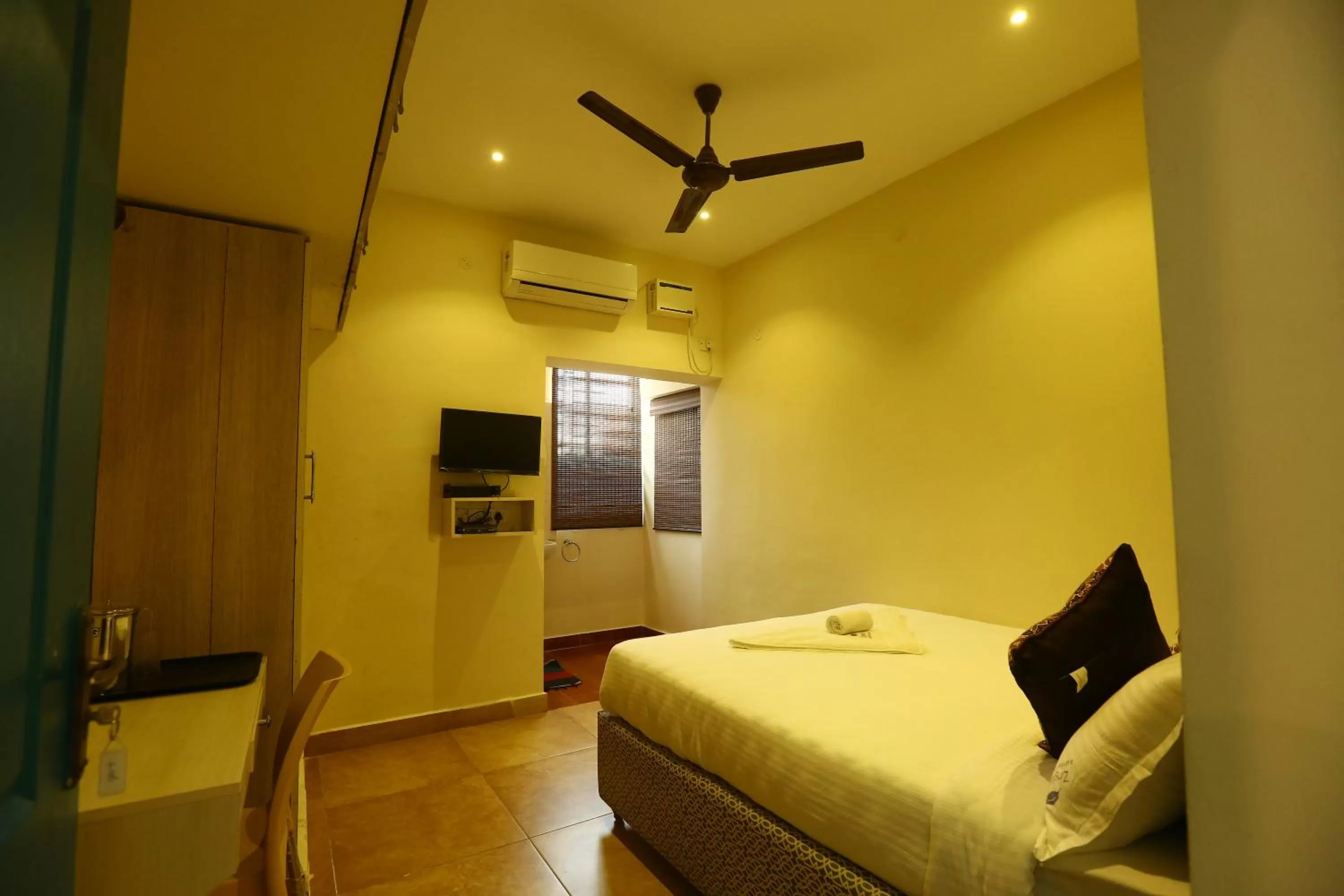 Bed in Zingle Stay Airport Hotel