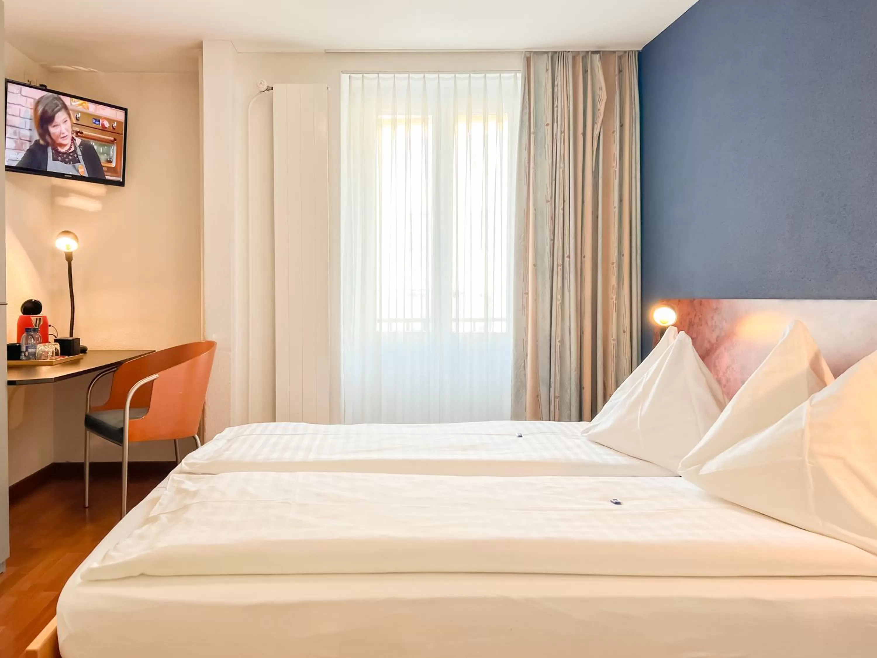 Bed in Hotel Rothaus Luzern & Peruvian Culinary Art