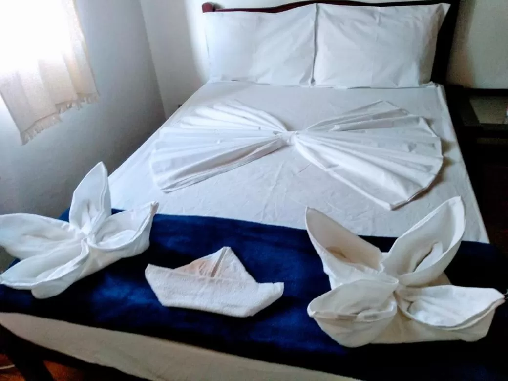 Bed in Pousada Beluga