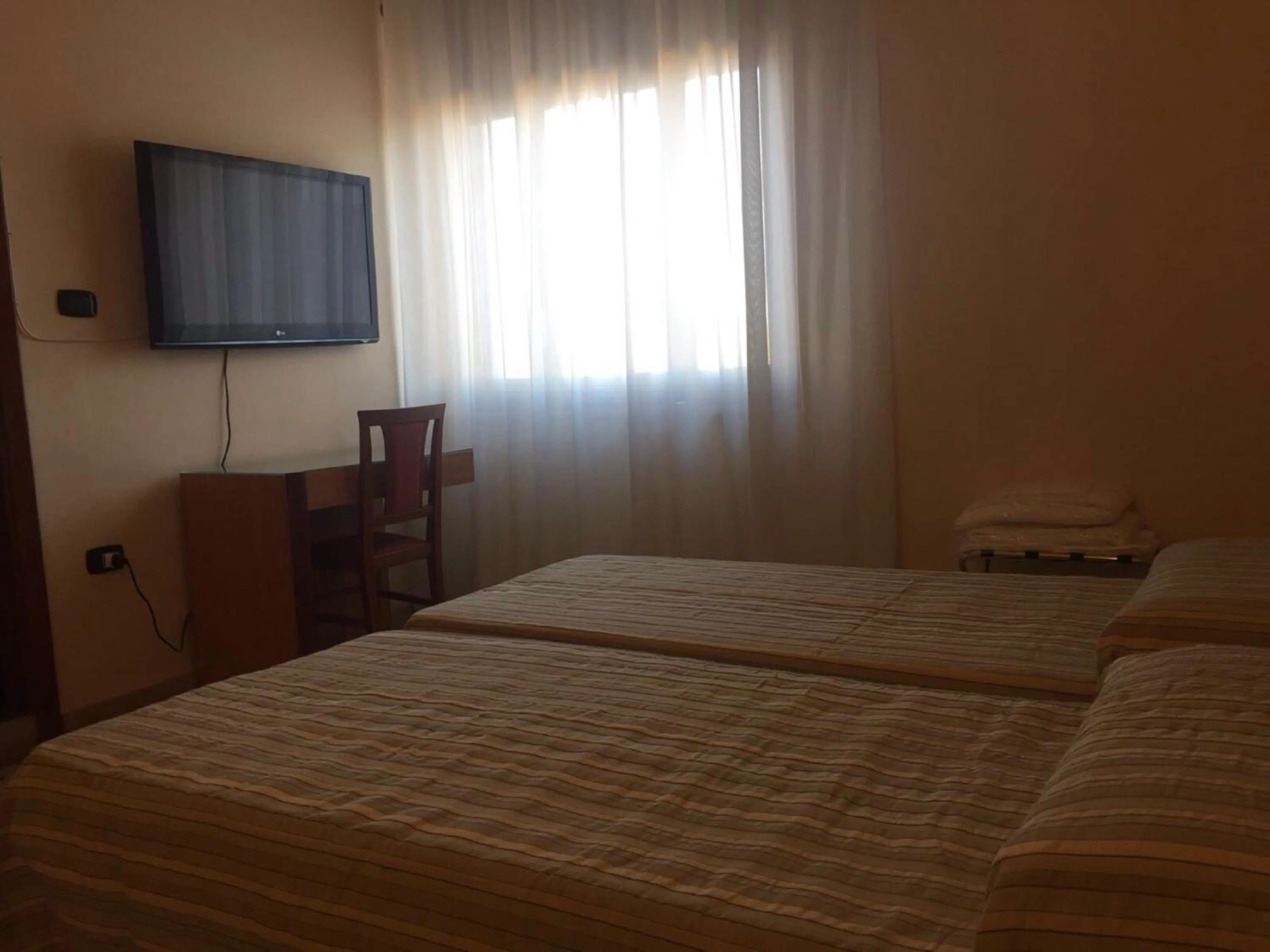 Photo of the whole room, Bed in Hotel La Casa Del Pellegrino