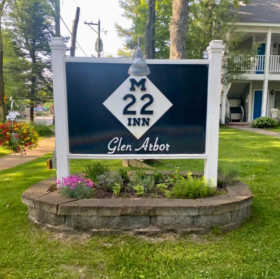 Property logo or sign in M22 Inn Glen Arbor