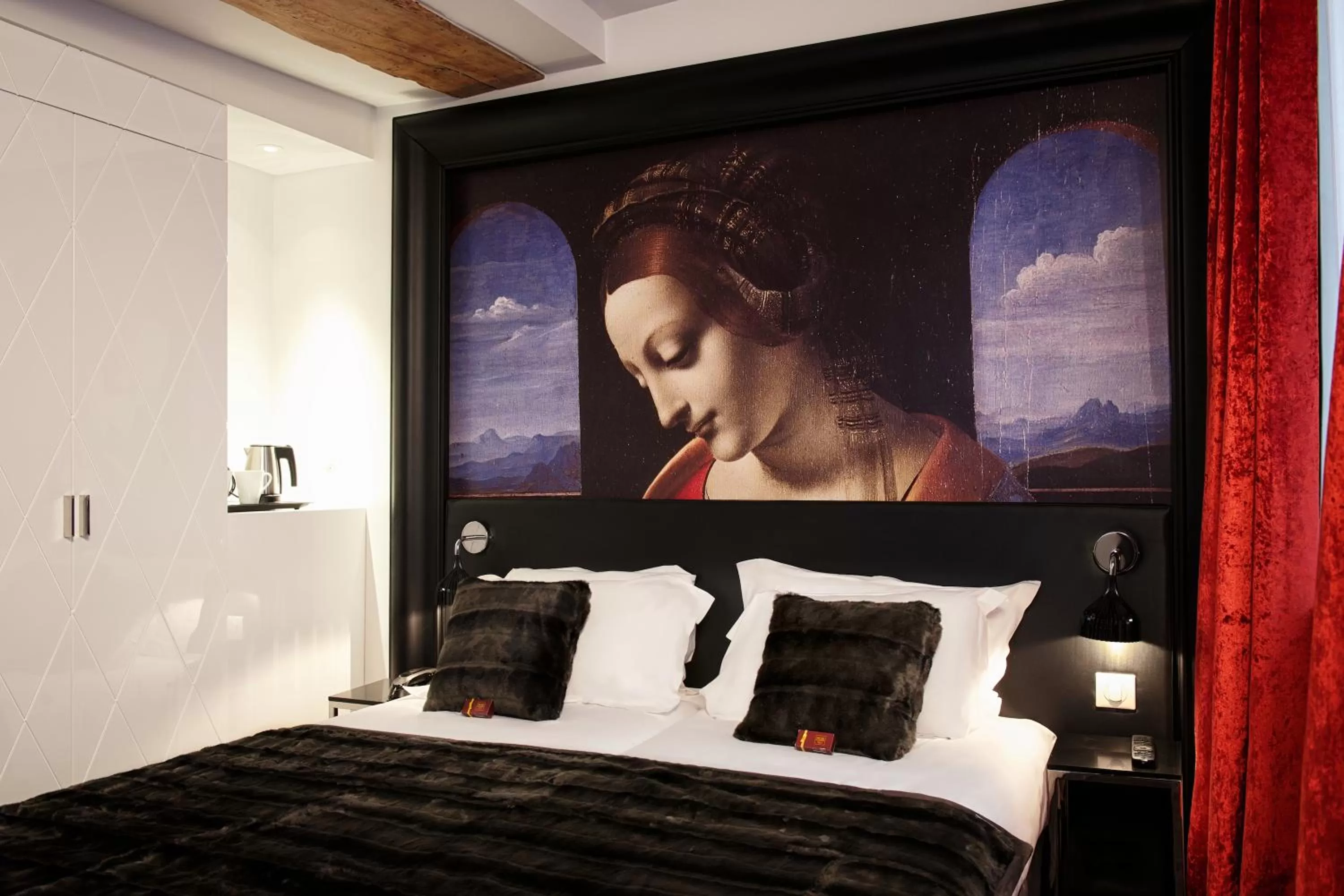 Bed in Hôtel le Clos de Notre Dame