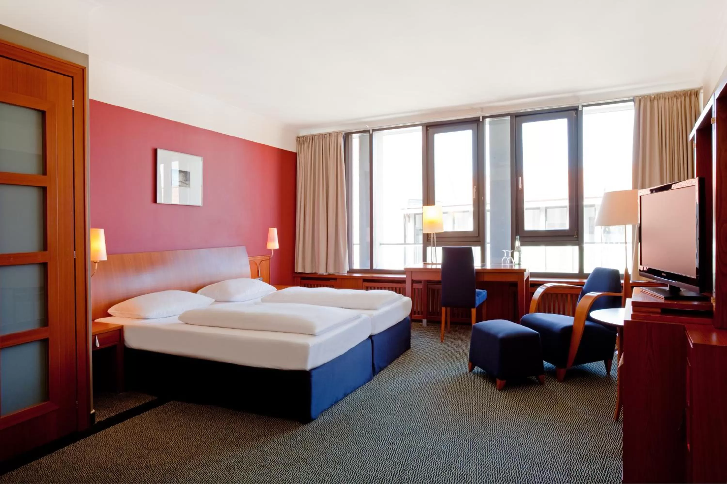 Photo of the whole room, Bed in Vienna House by Wyndham Sonne Rostock