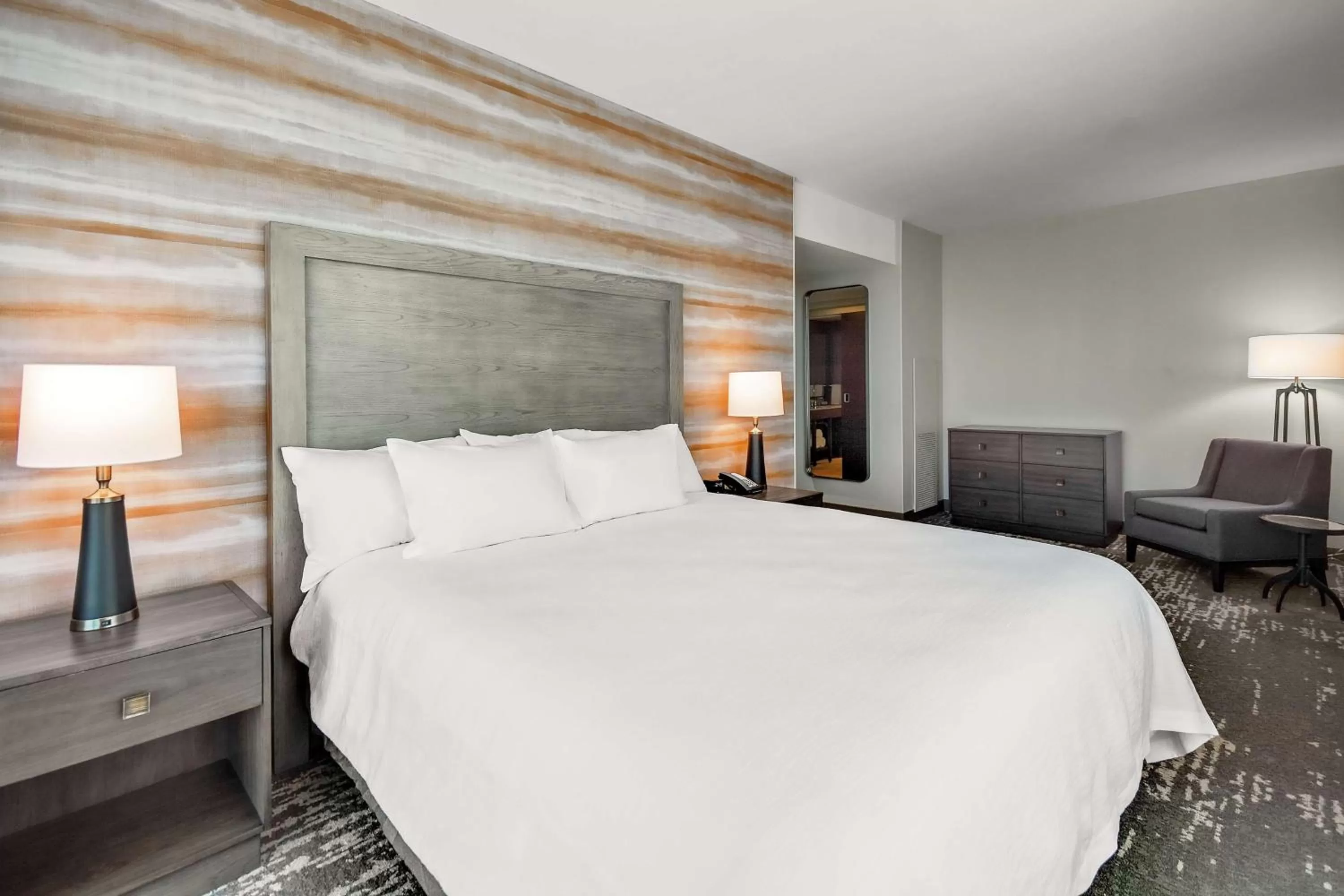 Bed in Embassy Suites by Hilton Jonesboro Red Wolf Convention Center