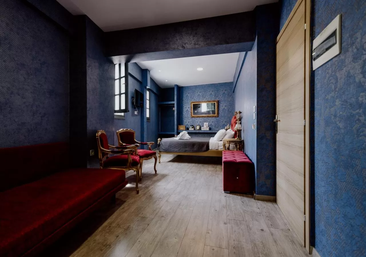 Photo of the whole room, Bed in ROH Suites