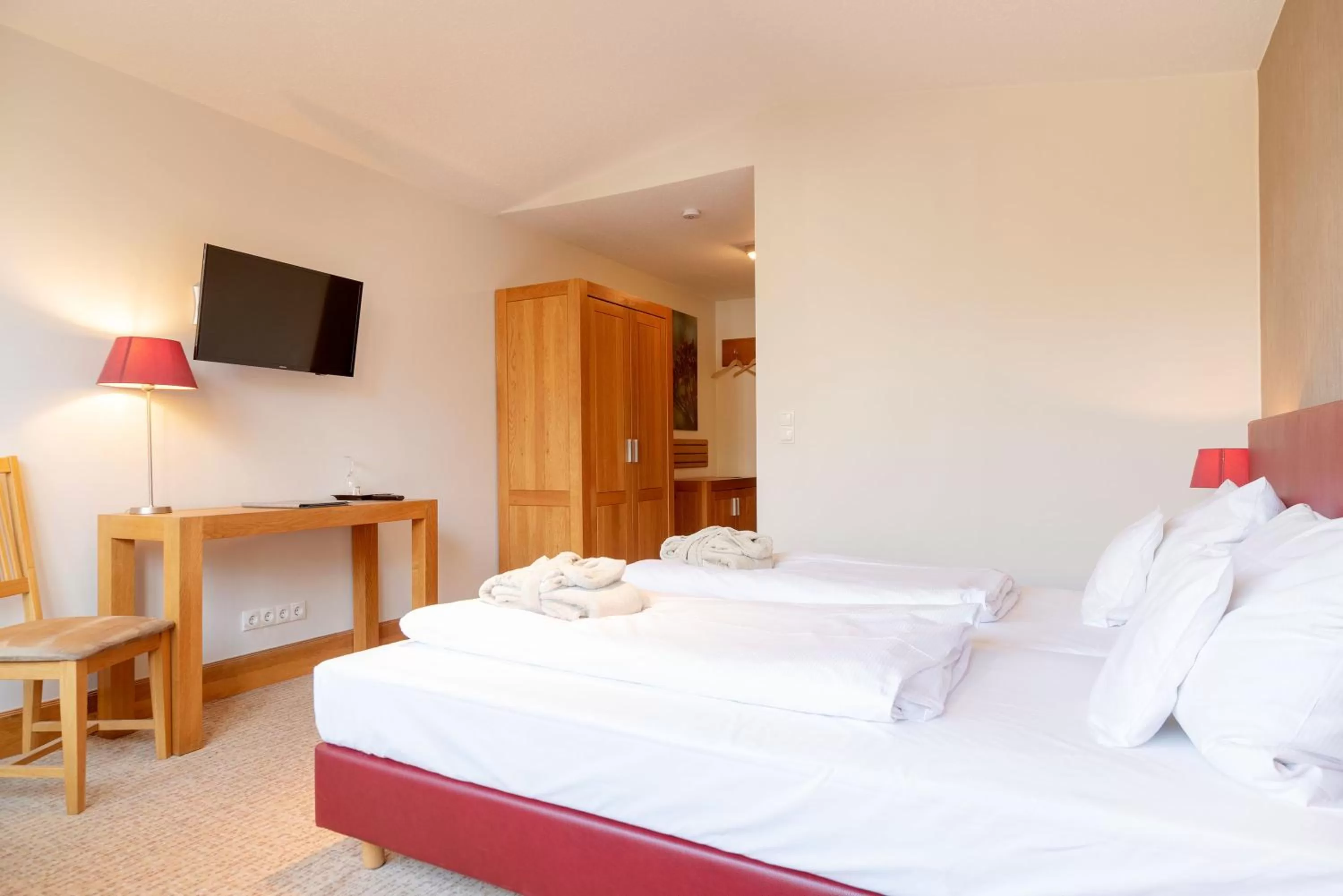 Photo of the whole room, Bed in Waldhotel Tannenhäuschen