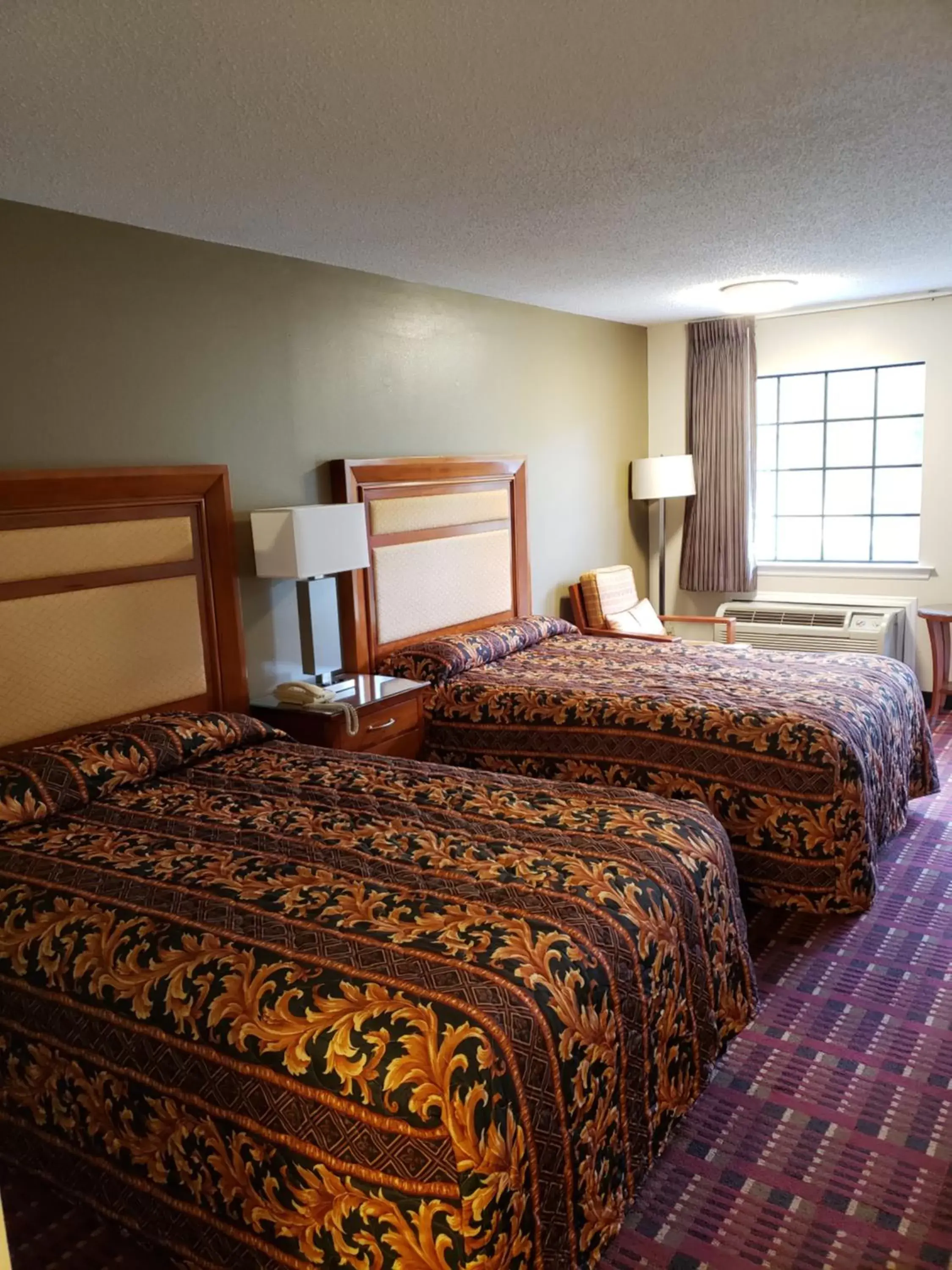 Queen Room with Two Queen Beds - Smoking in Peach Tree Inn Queen Room with Two Queen Beds - Smoking in Peach Tree Inn