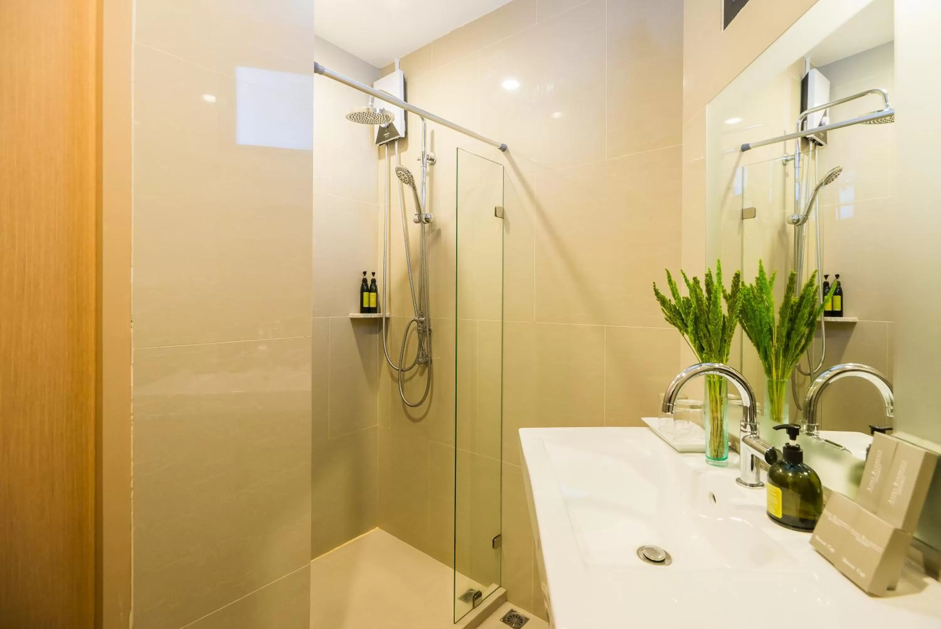 Bathroom in Asoke Residence Sukhumvit by UHG