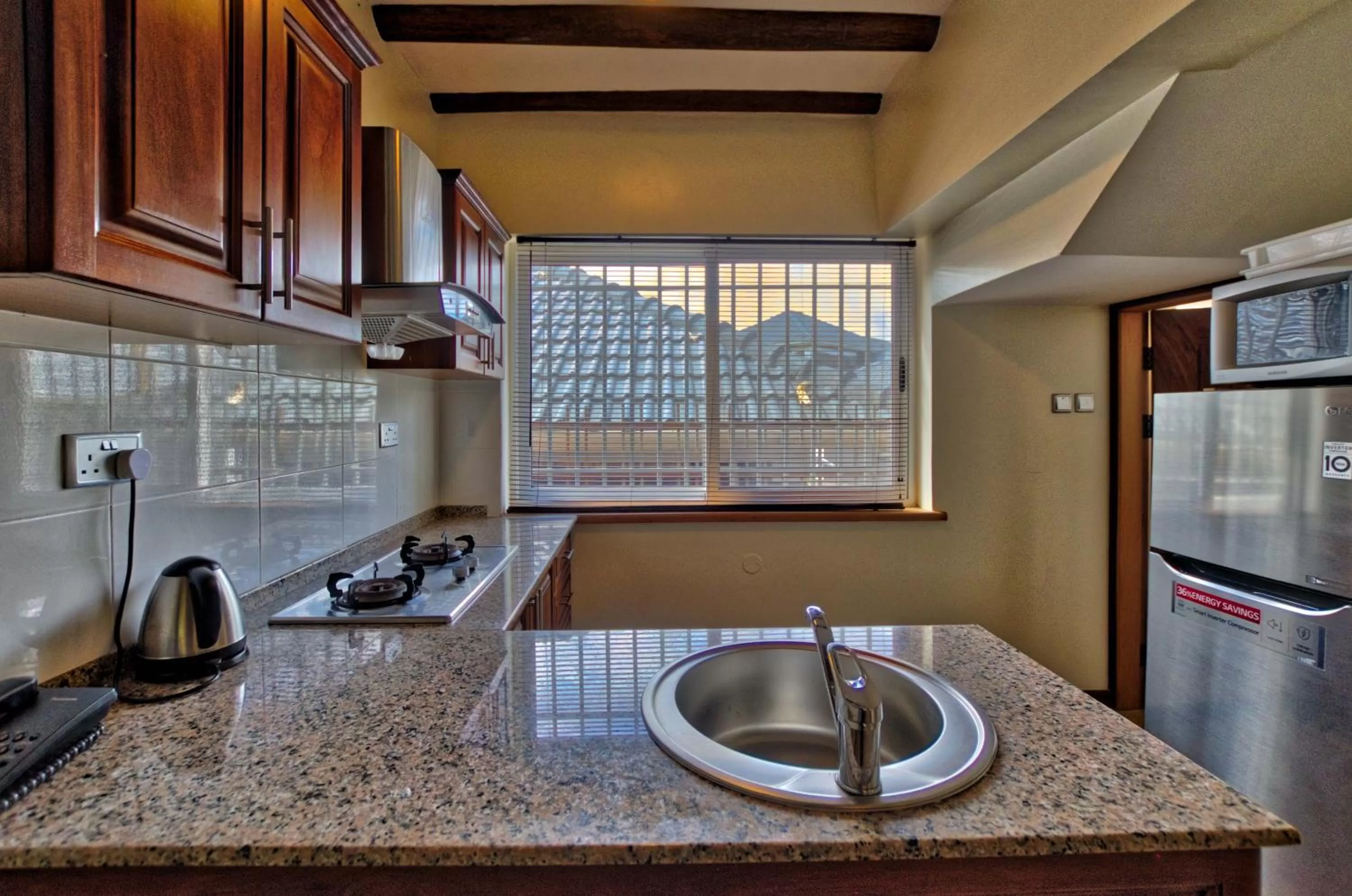 Kitchen/Kitchenette in No.5 Boutique Hotel