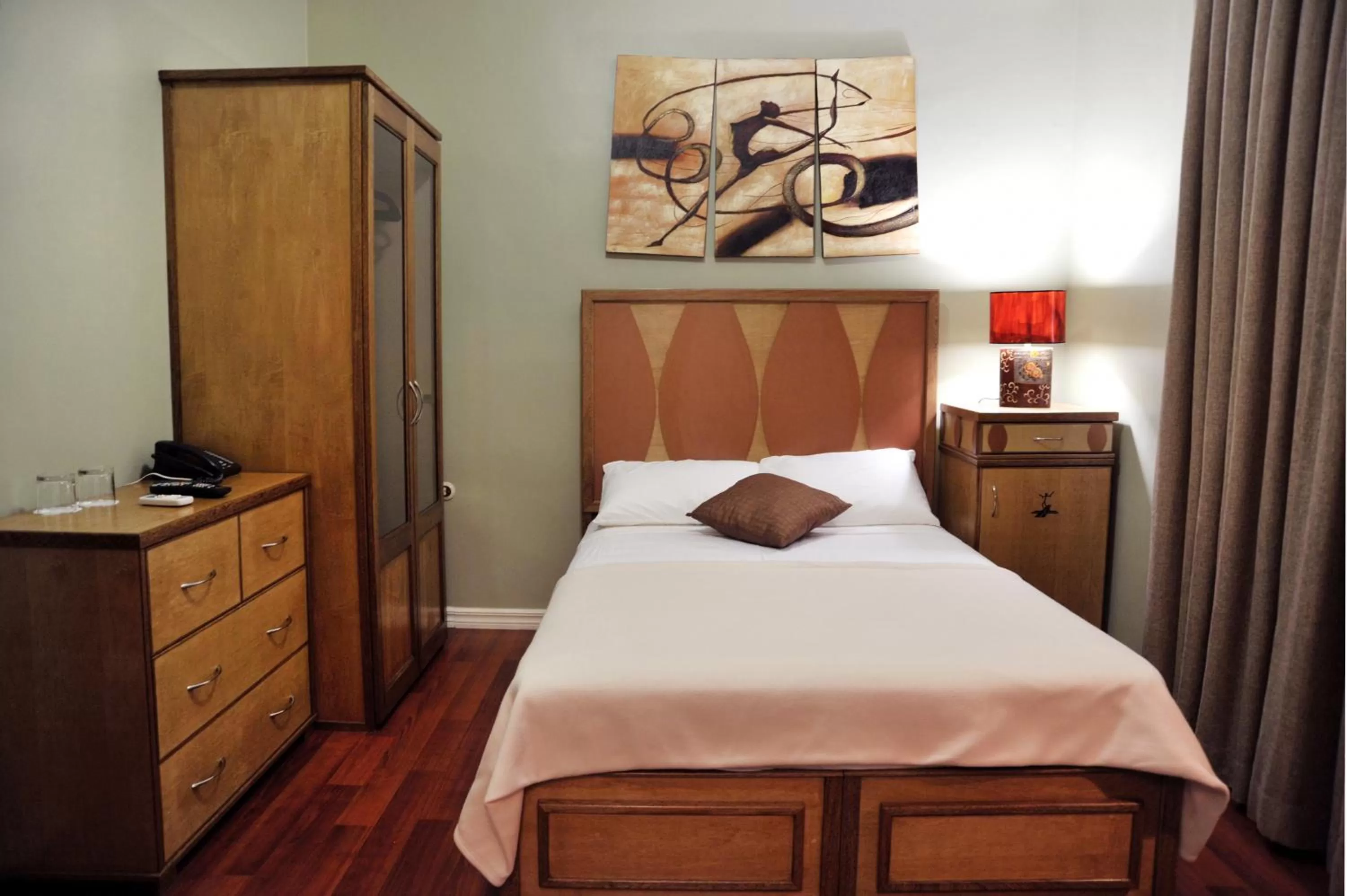 Bed in Culture Crossroads Inn