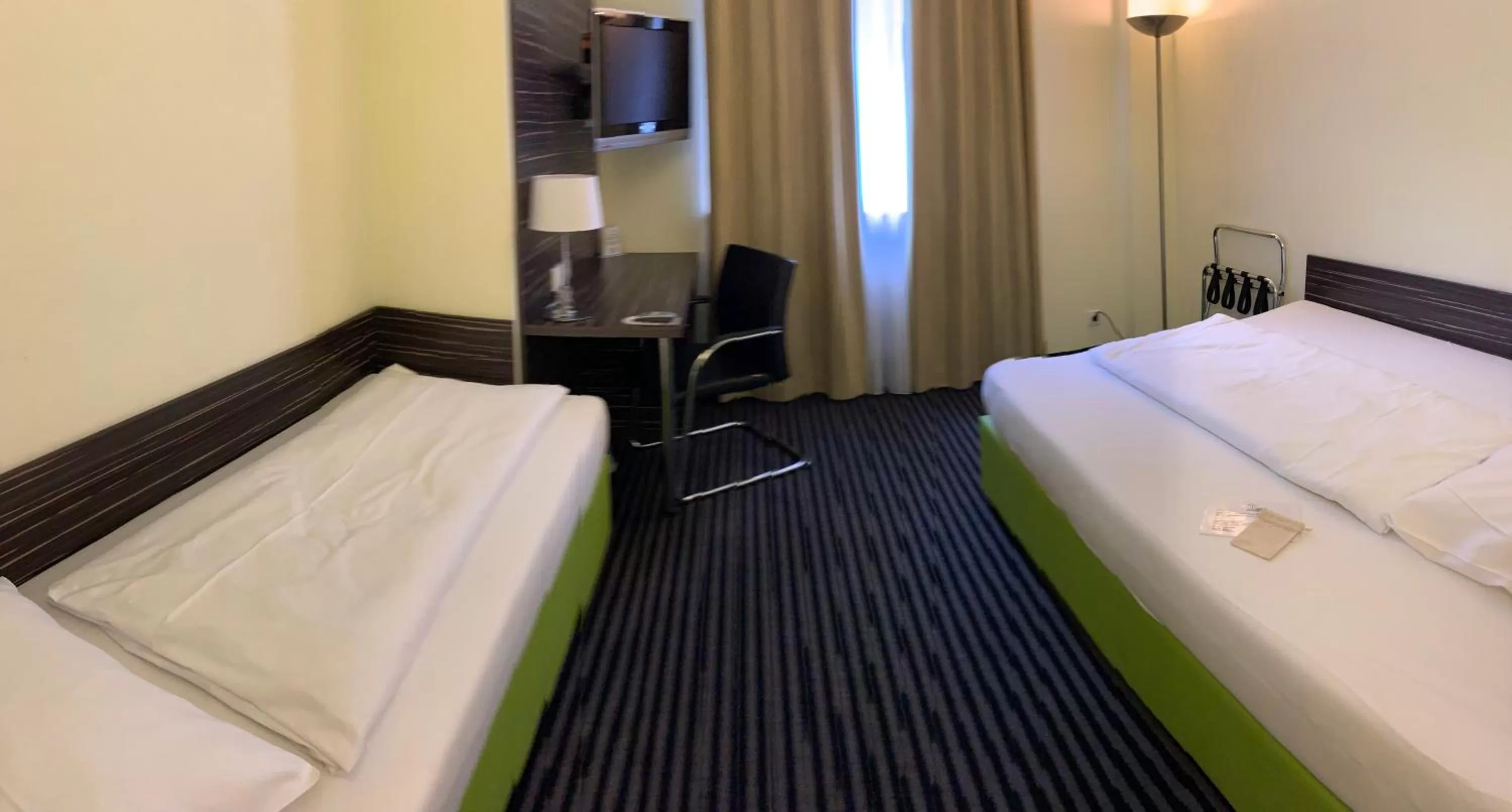 Photo of the whole room, Bed in Behringers City Hotel Nürnberg