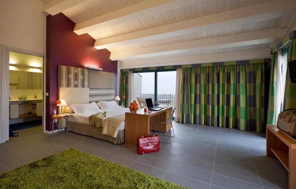 Bed in Poggio Del Sole Hotel