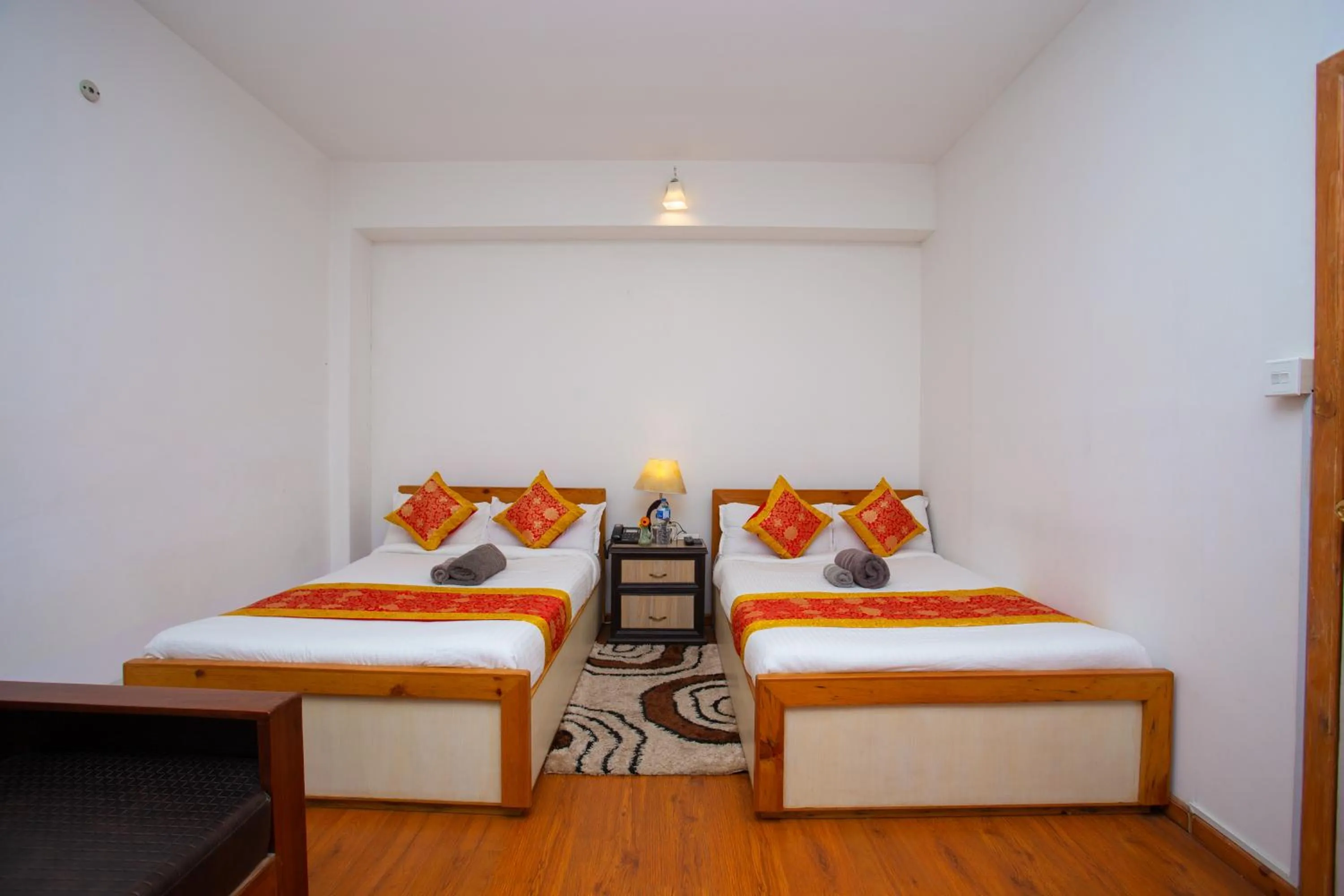 Bed in The Boudha Inn