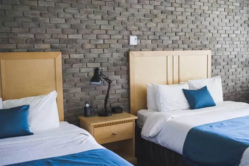 Staff, Bed in Hostellerie Baie Bleue