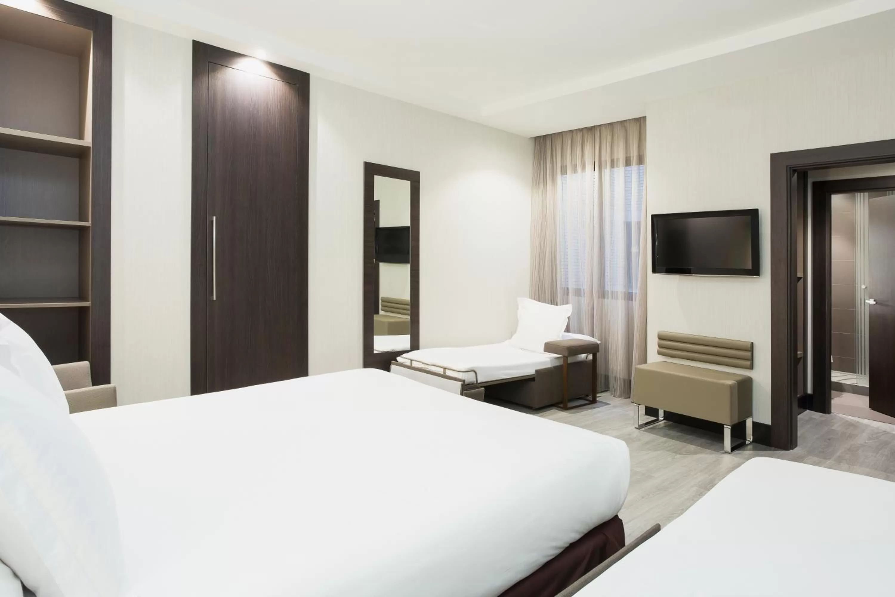 Standard Room with One Queen Bed and Two Single Beds in Novotel Madrid Center