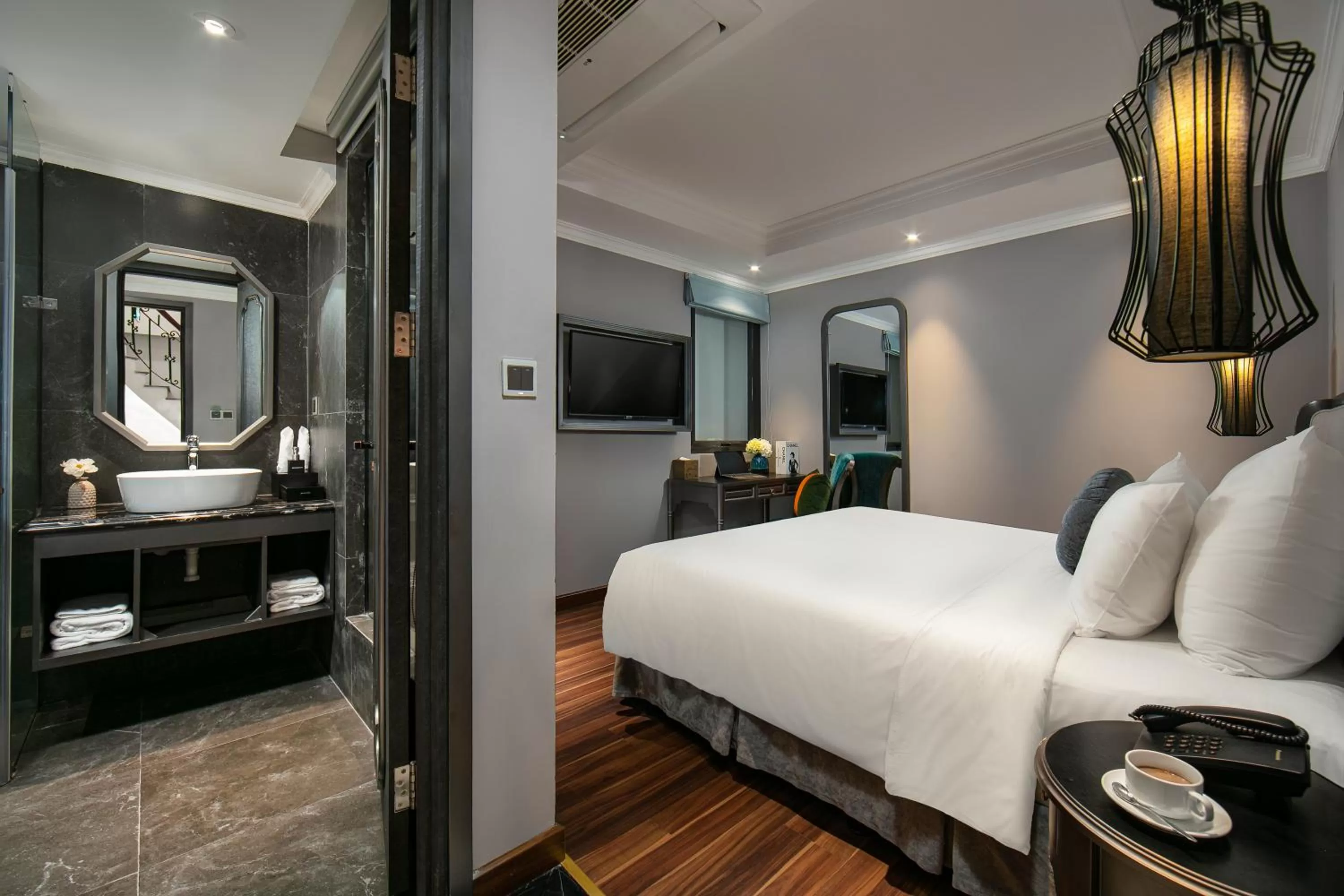 Photo of the whole room, Bed in Hanoi L'Heritage Hotel & Gym - Spa