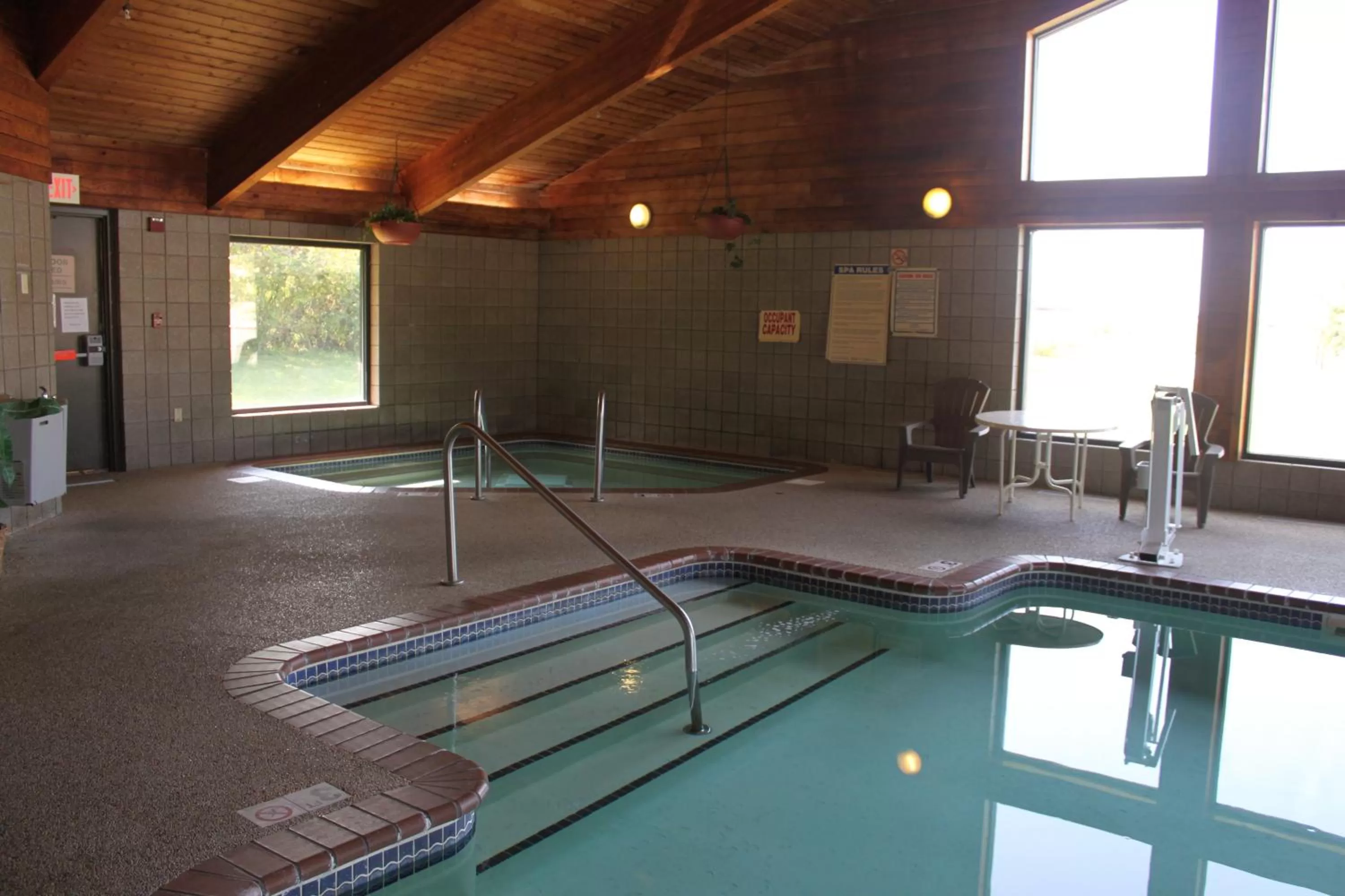 Swimming pool in AmericInn by Wyndham West Burlington
