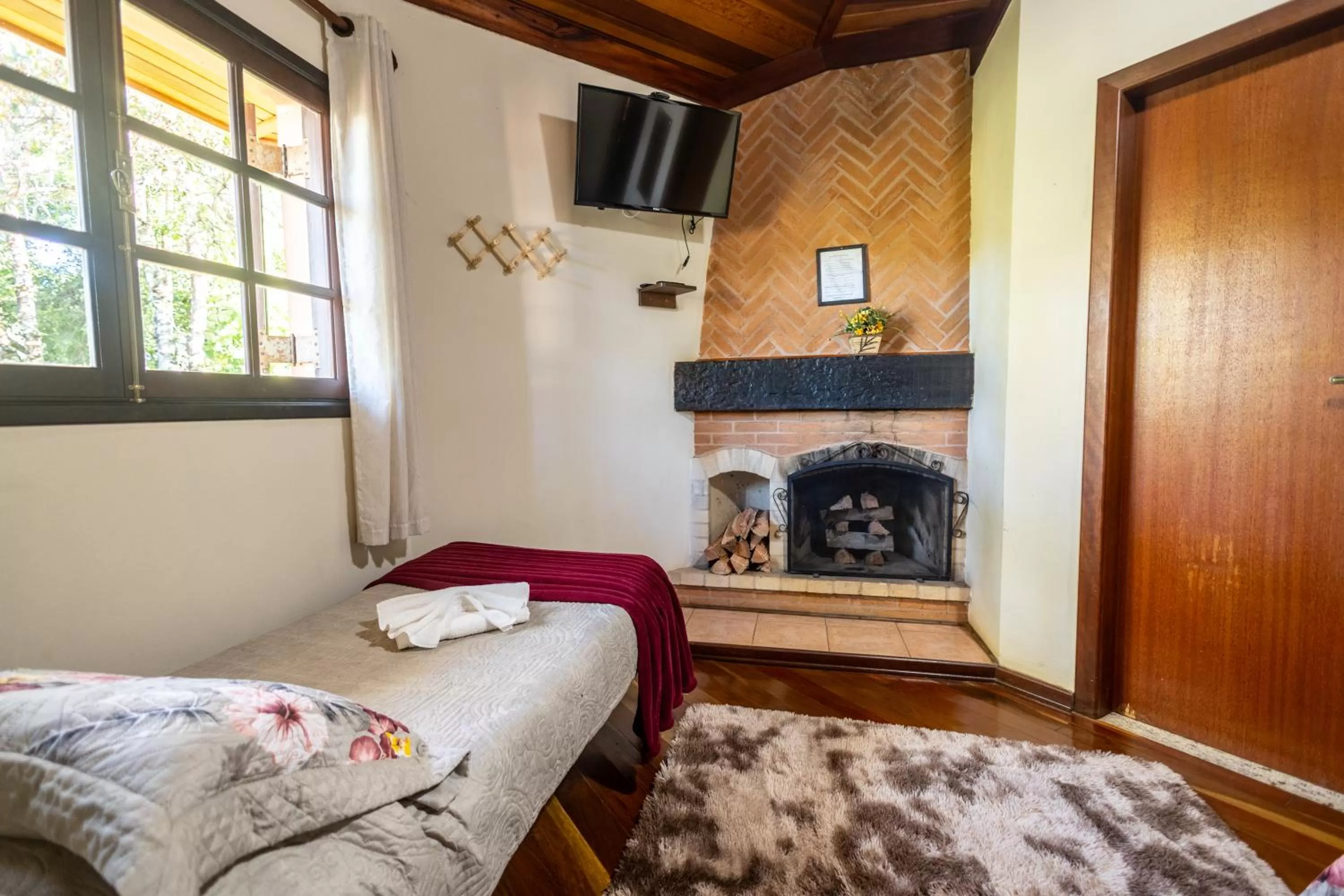 Bed in Pousada 3 Pinheiros