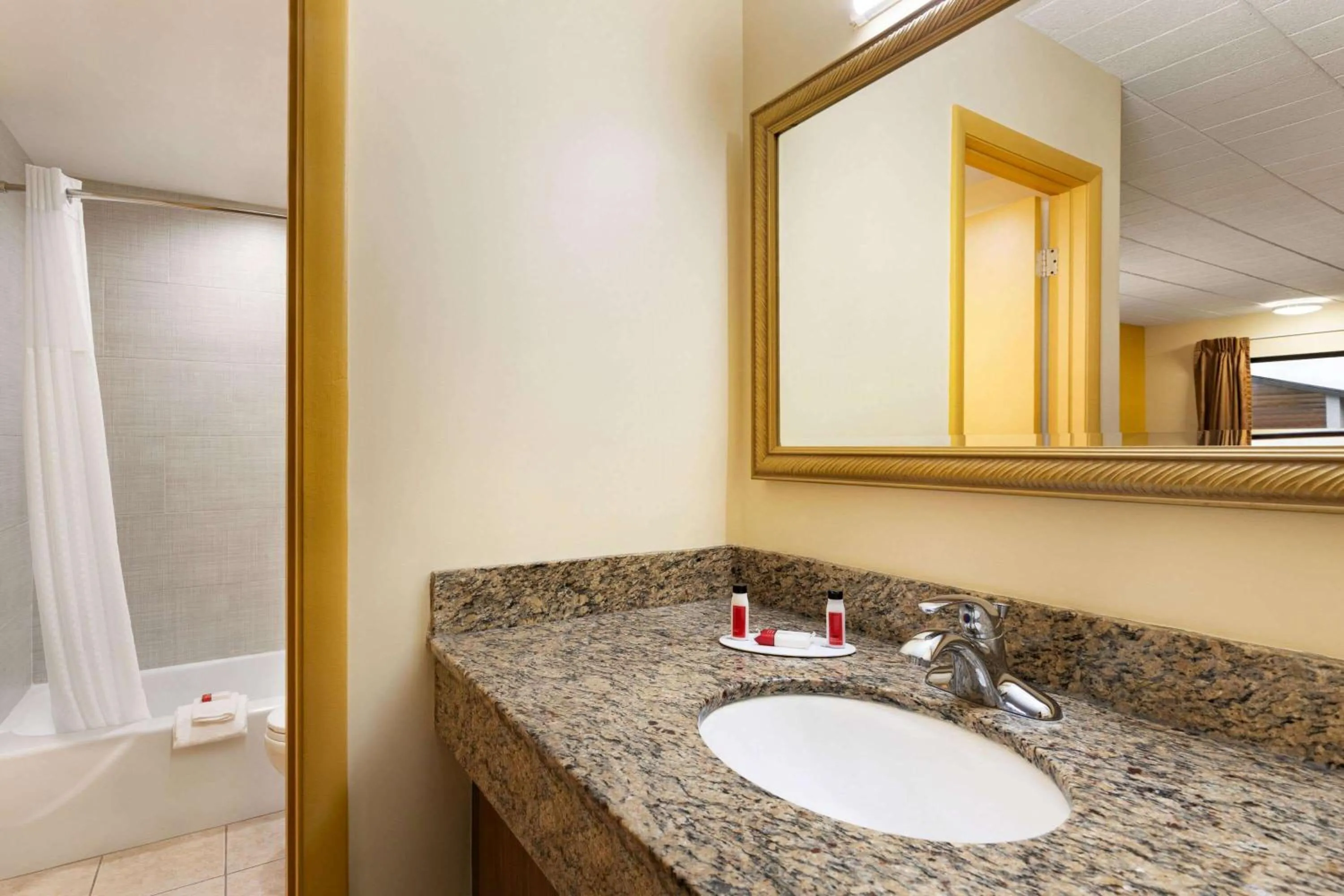 Bathroom in Days Inn by Wyndham Oak Ridge Knoxville