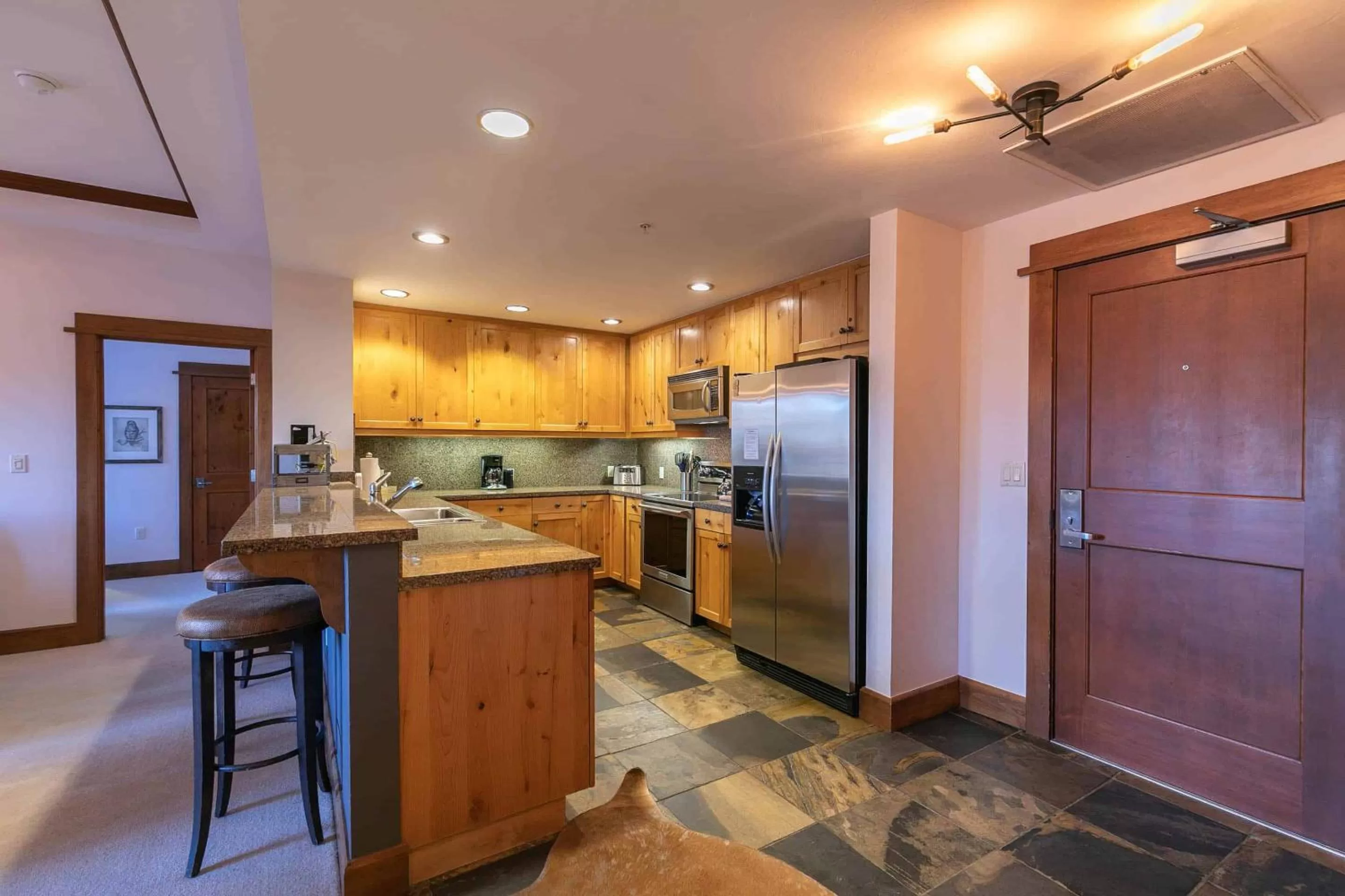Kitchen/Kitchenette in East West Hospitality at Tahoe
