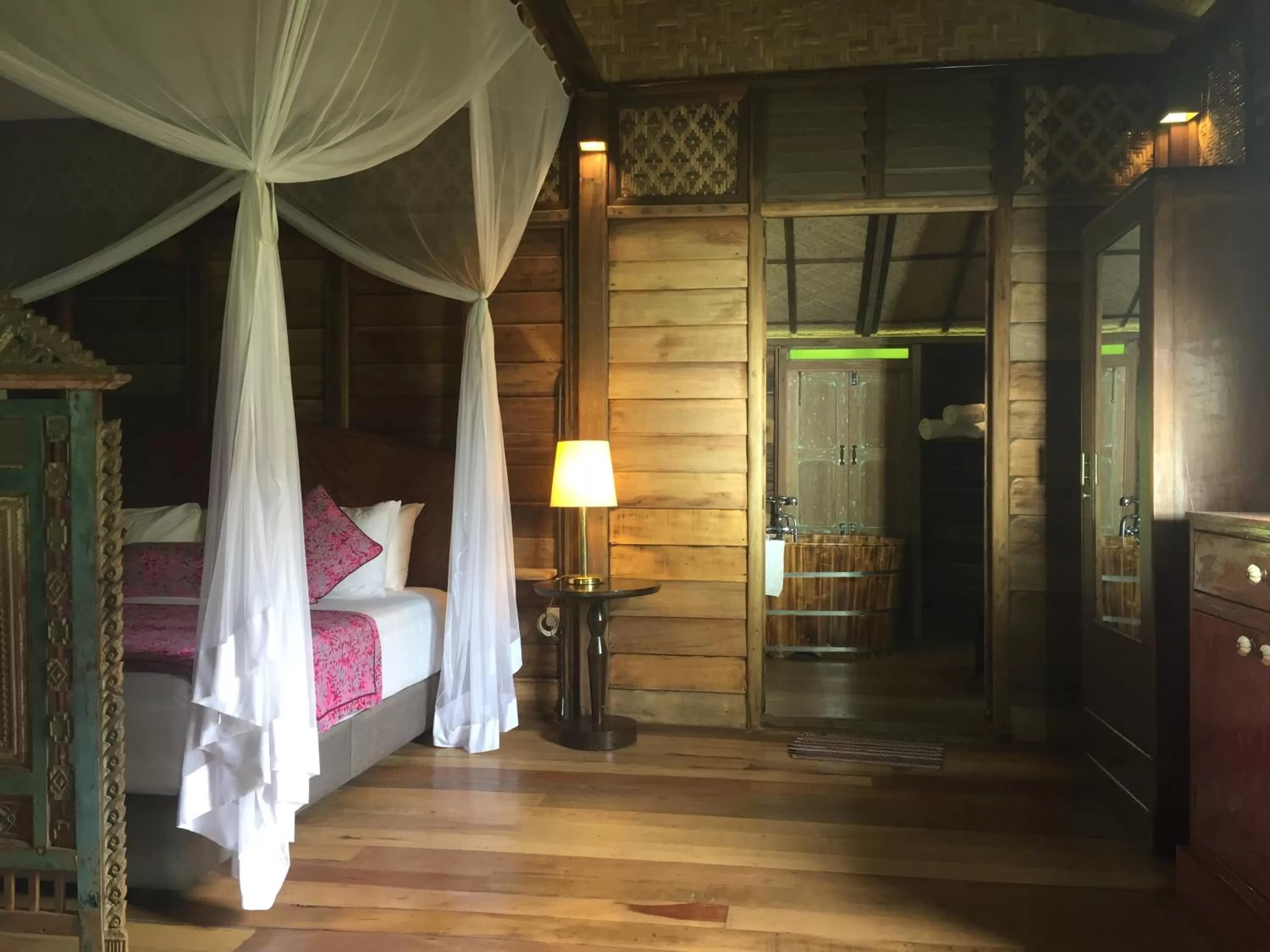 Bed in Kunang Kunang Heritage Villas