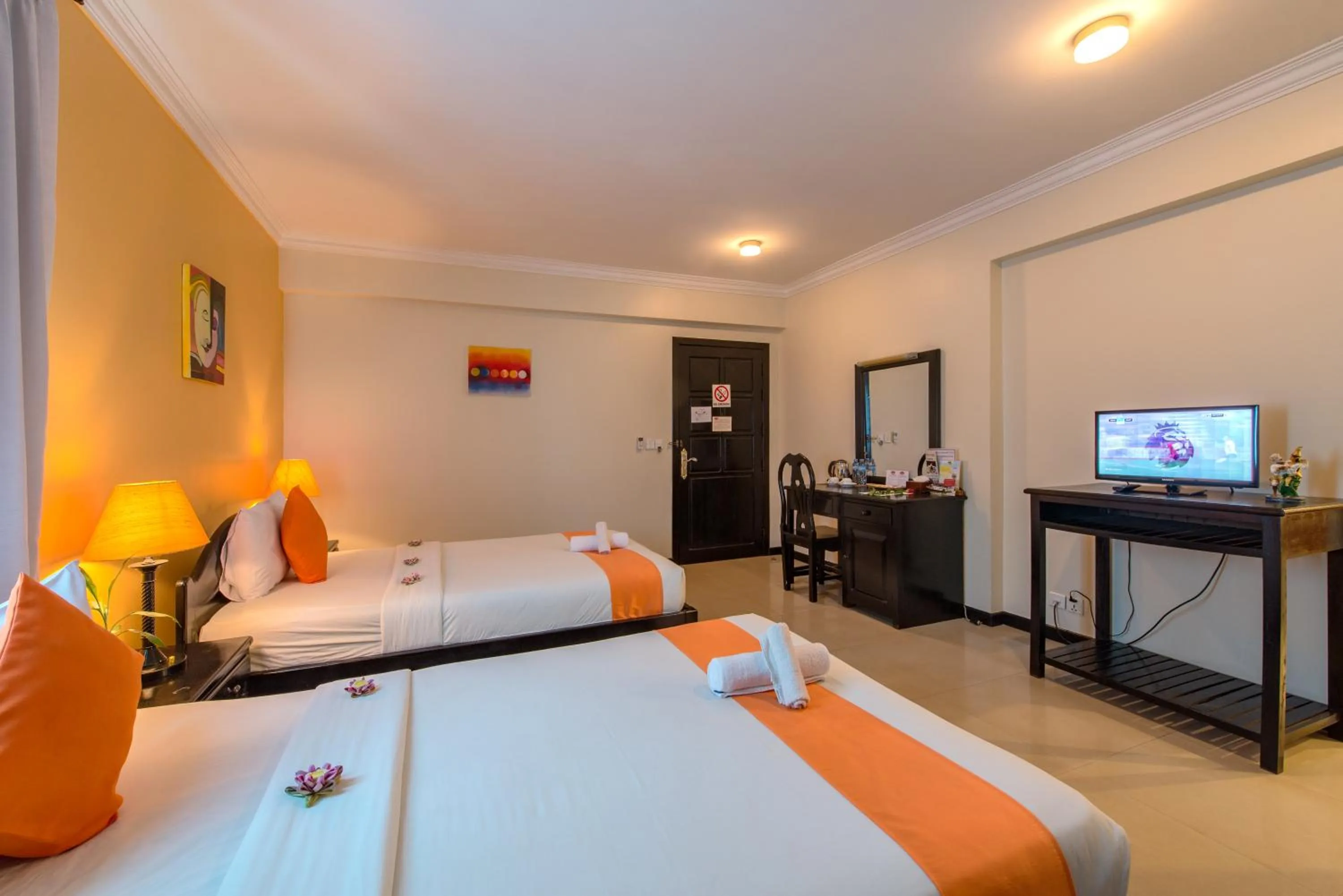 Photo of the whole room, Bed in Angkor Panoramic Boutique Hotel