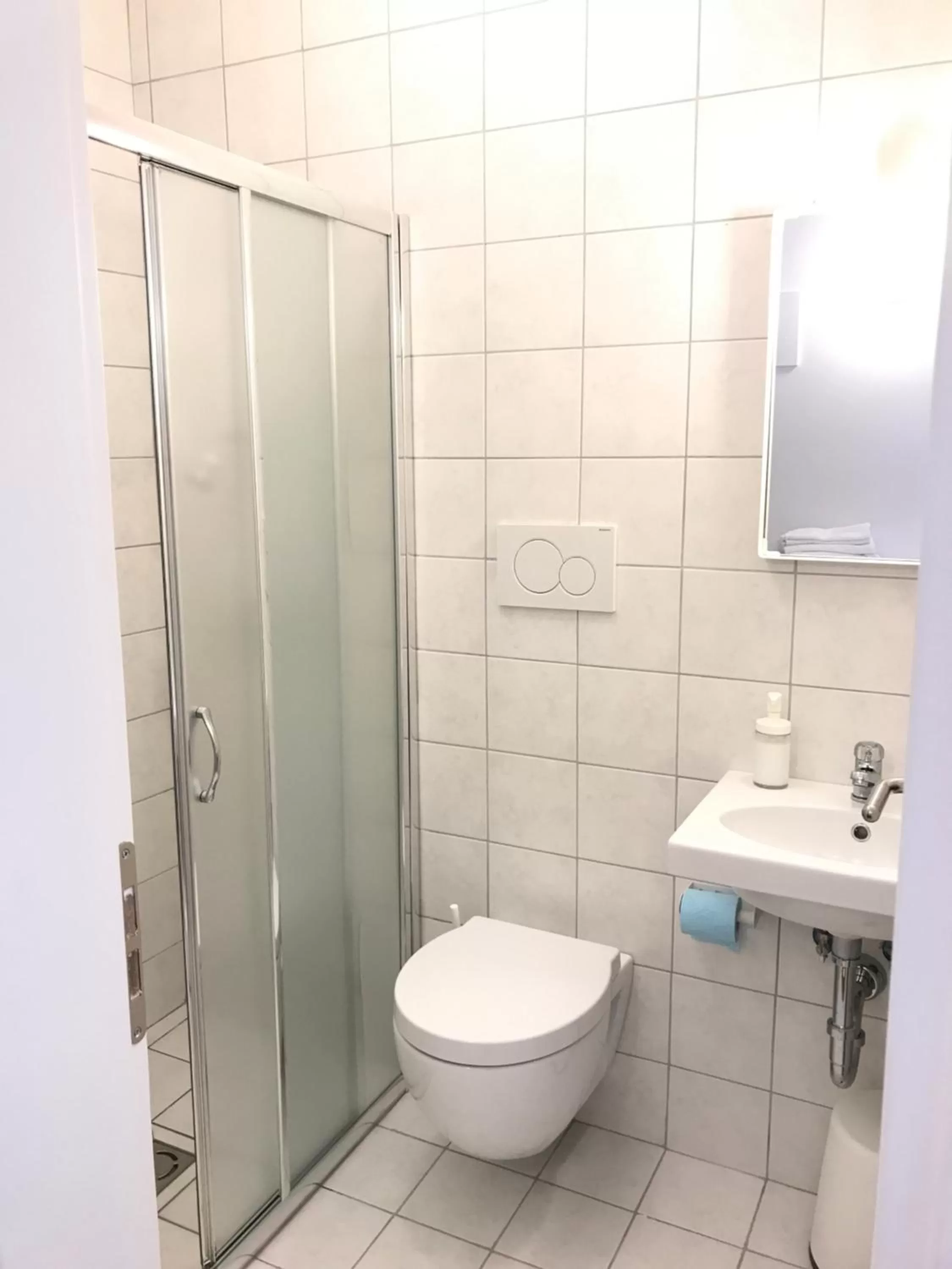 Bathroom in Aleksi rooms