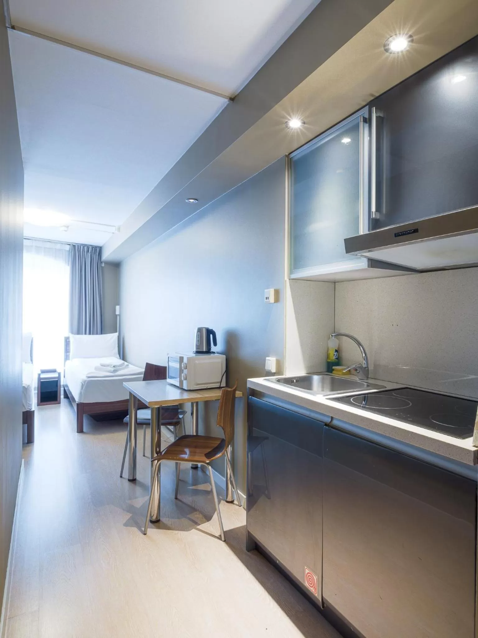 Bed in Central City Apartments