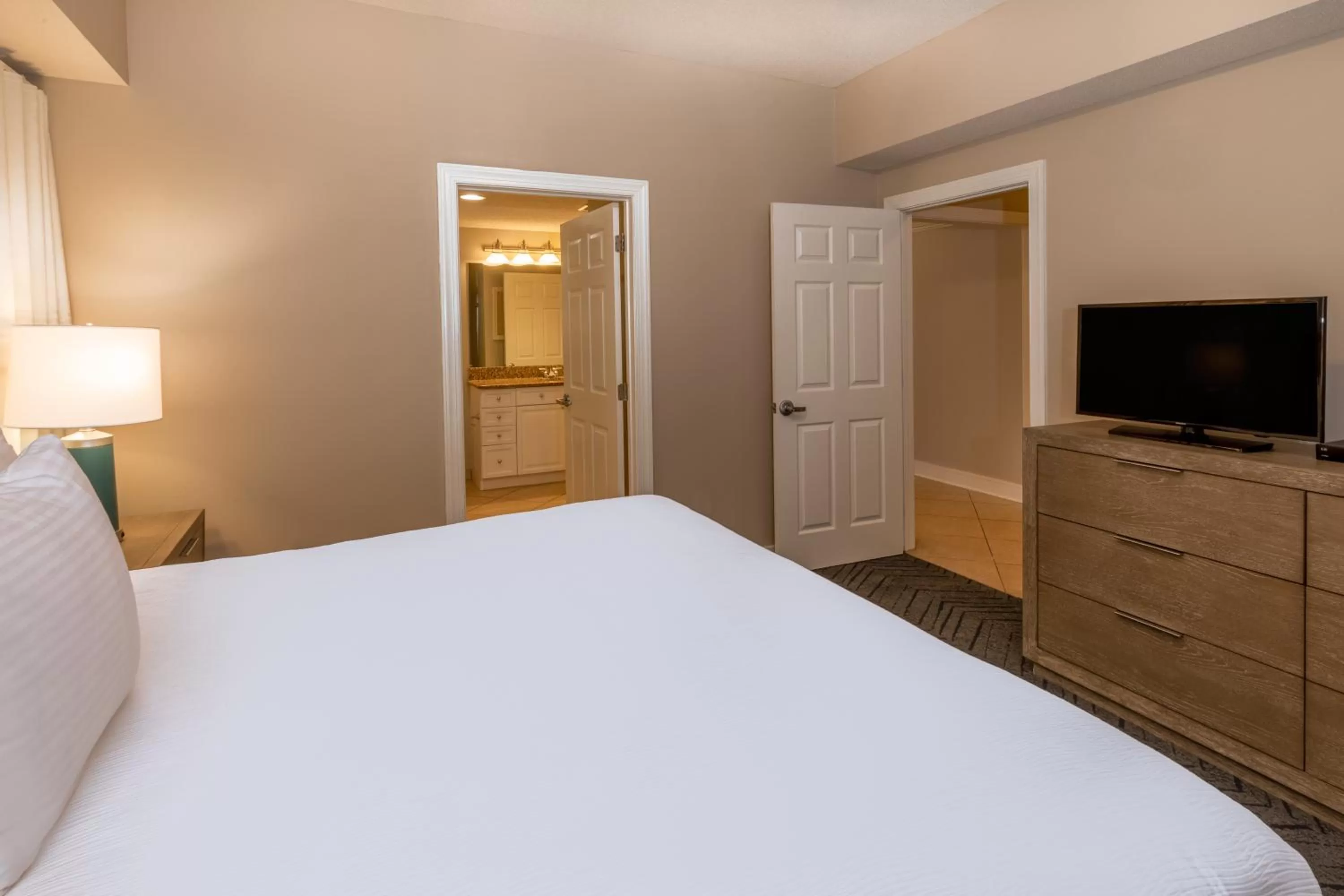 Bed in Escapes! To The Shores Orange Beach, A Ramada by Wyndham