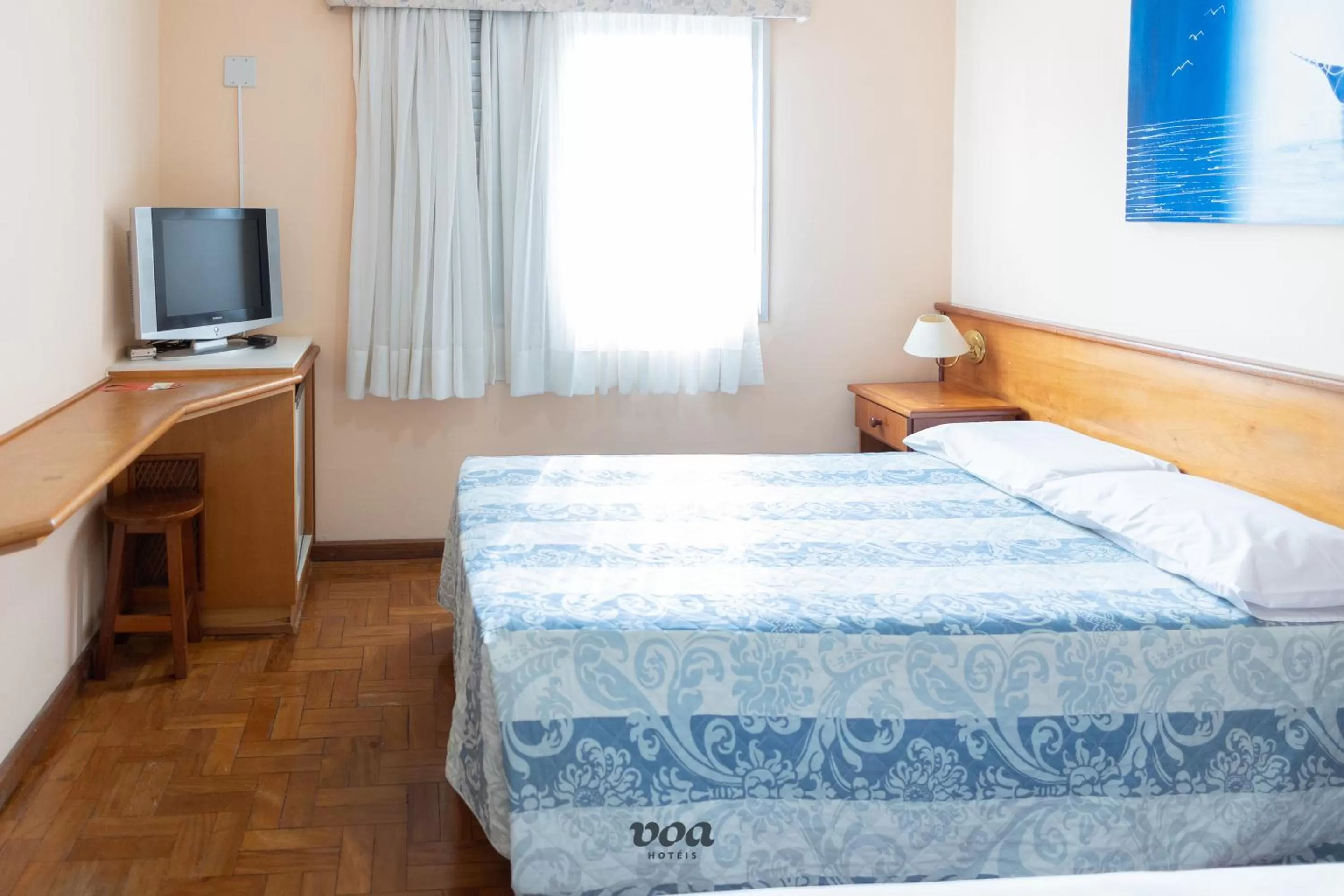 Bed in VOA Plazza Hotel