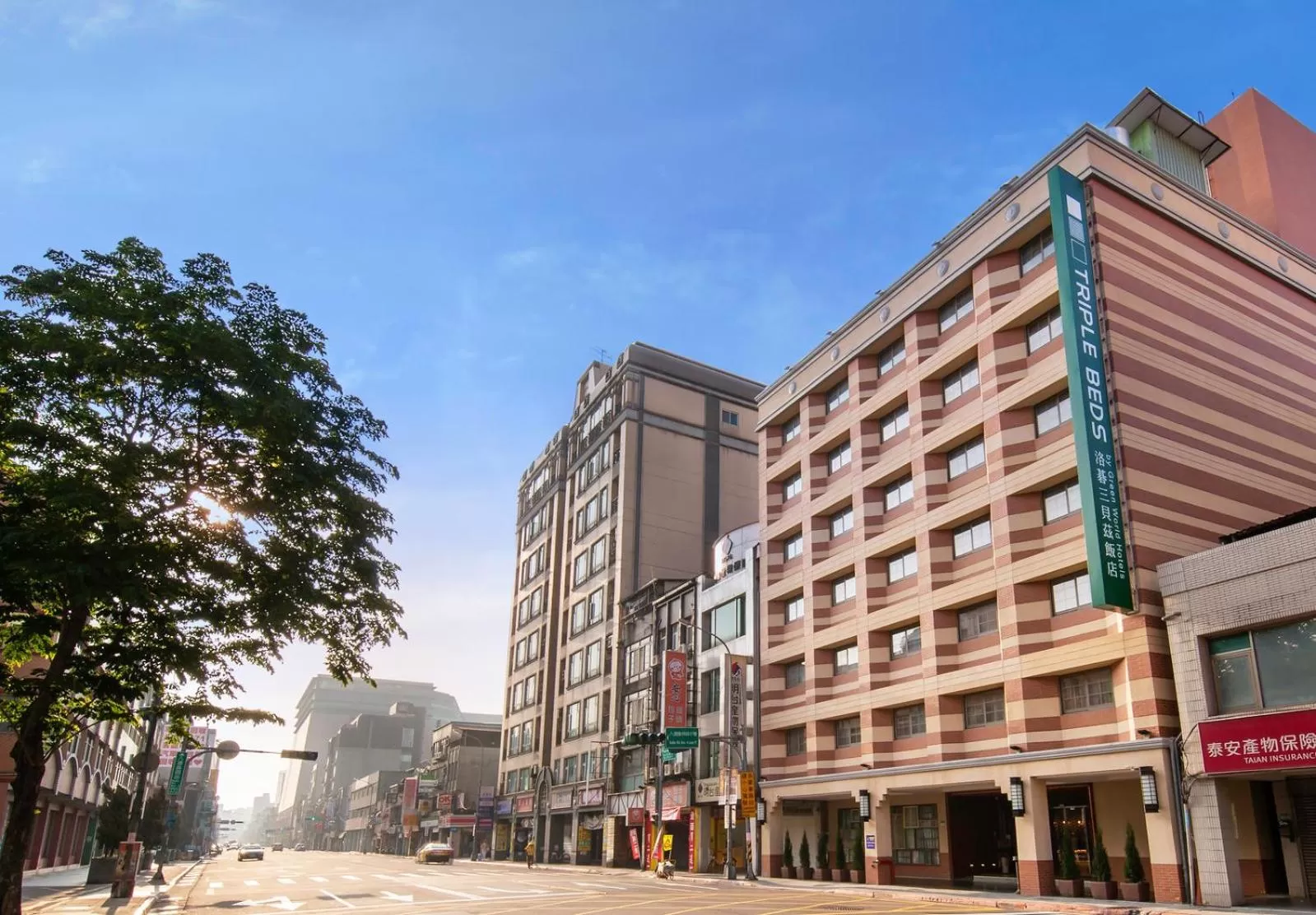 Property building in Green World Triple Beds