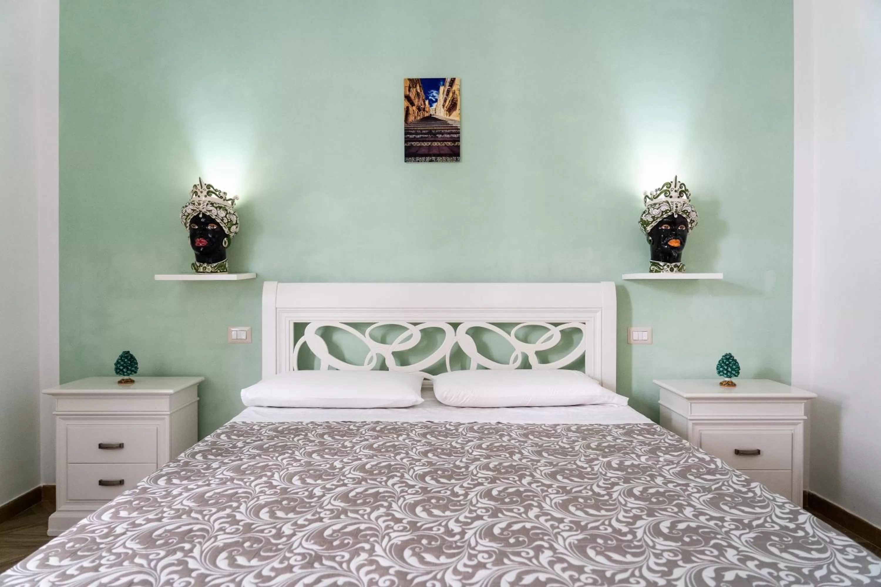 Bed in Portosalvo Rooms