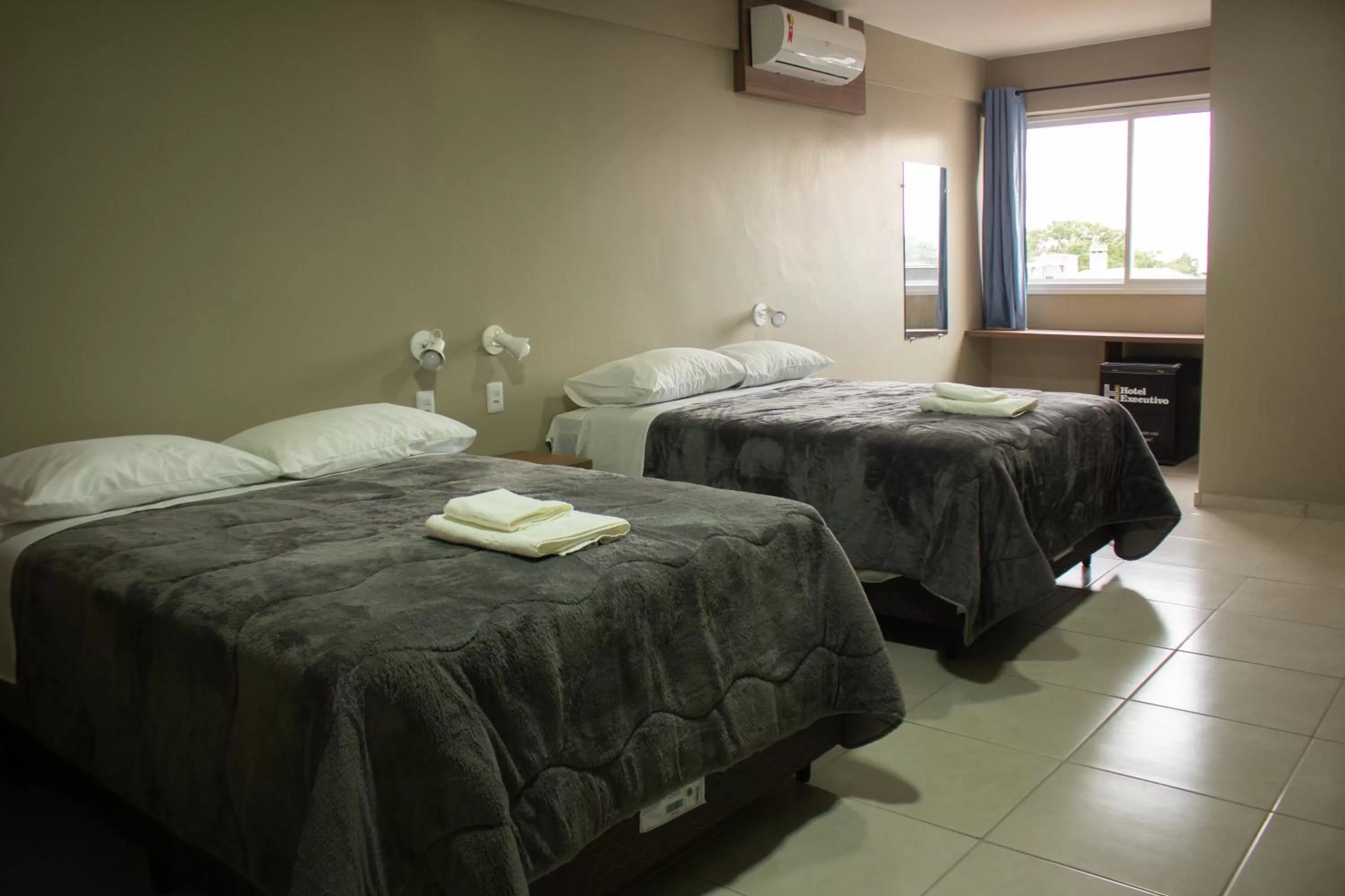 Bed in Hotel Executivo