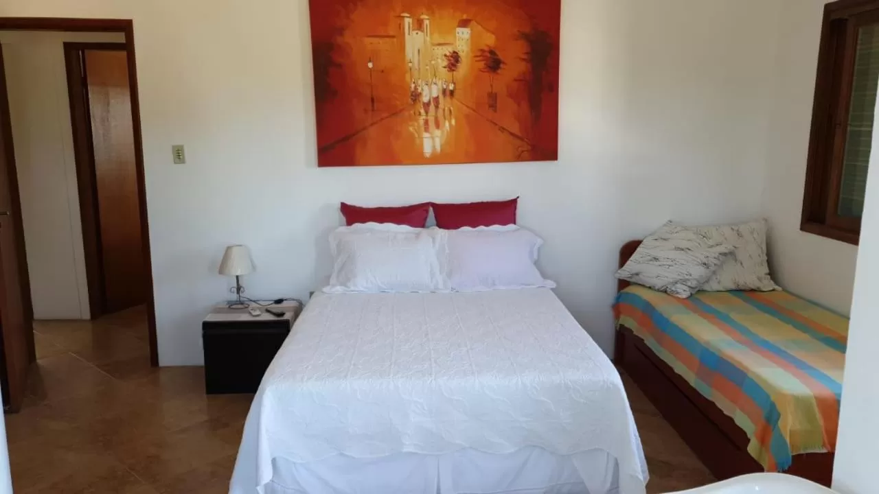 Bed in Pousada Itapuã RS