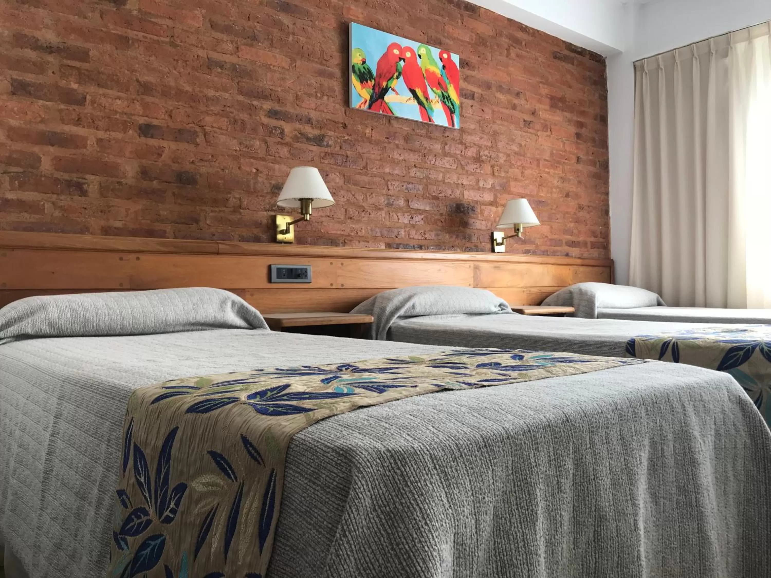 Bed in Costanera Mar Hotel & Suites