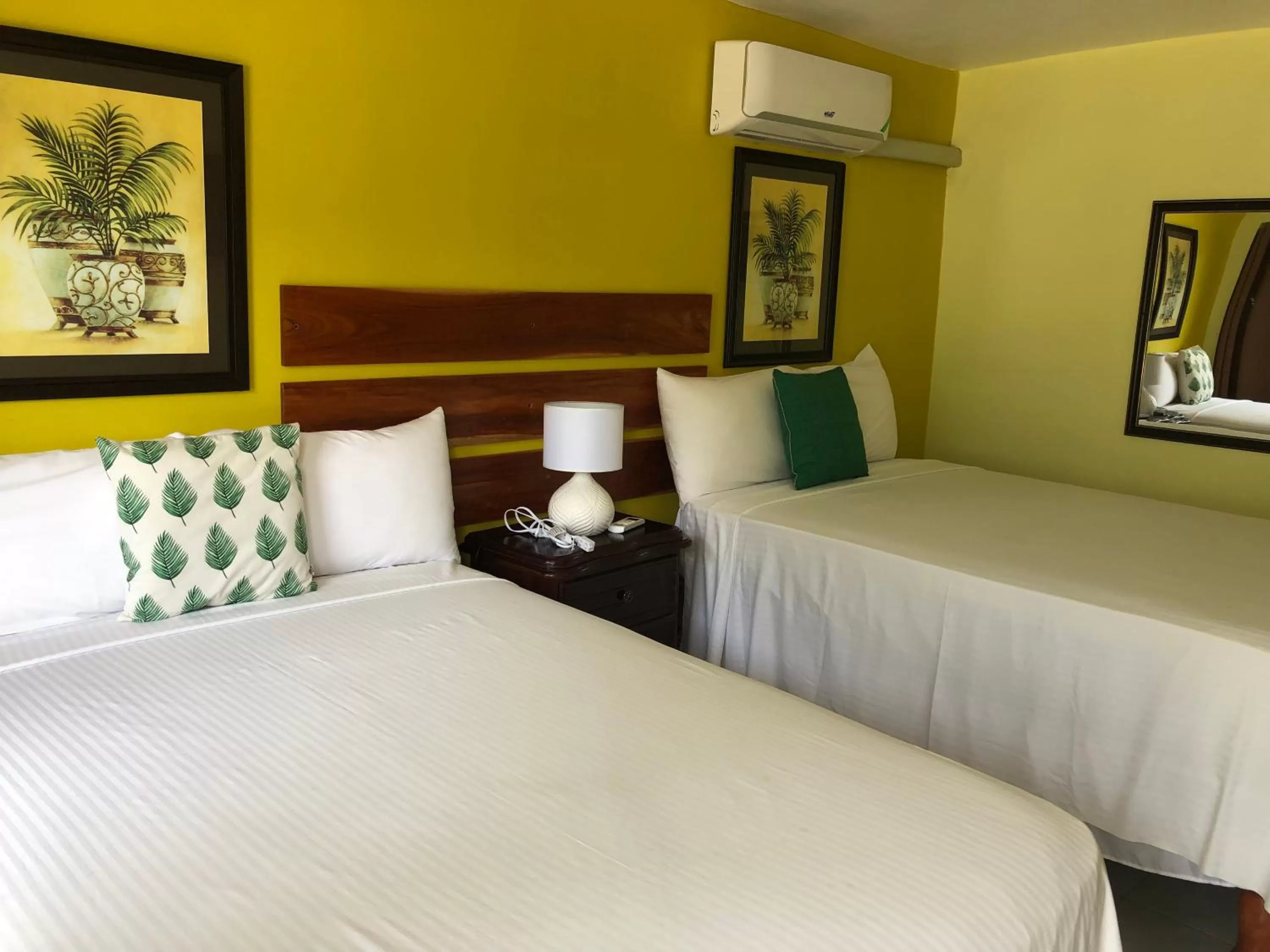 Bed in Airport Beach Hotel