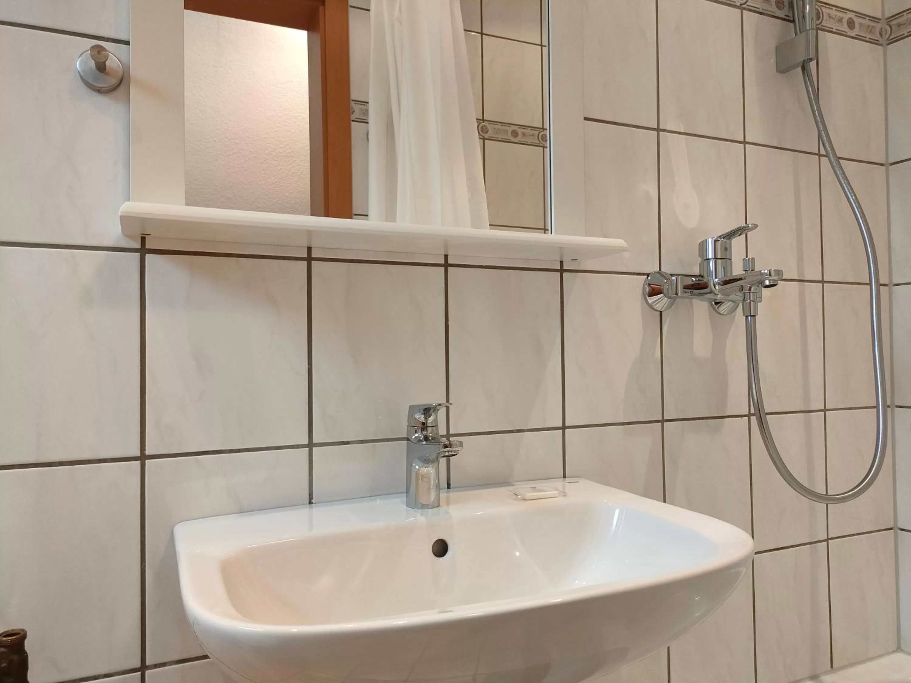 Bathroom in AM BERG Hotel