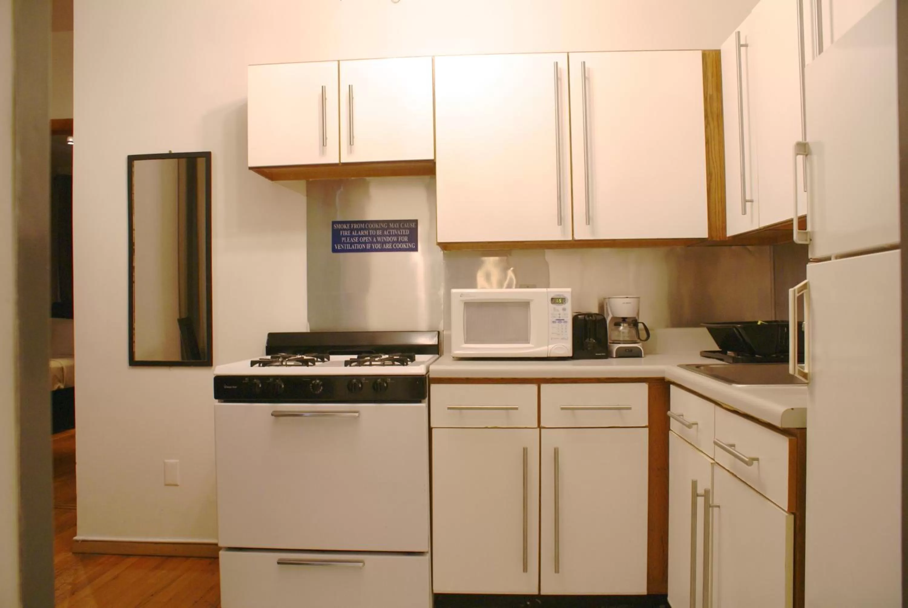 Kitchen or kitchenette in Off SoHo Suites Hotel