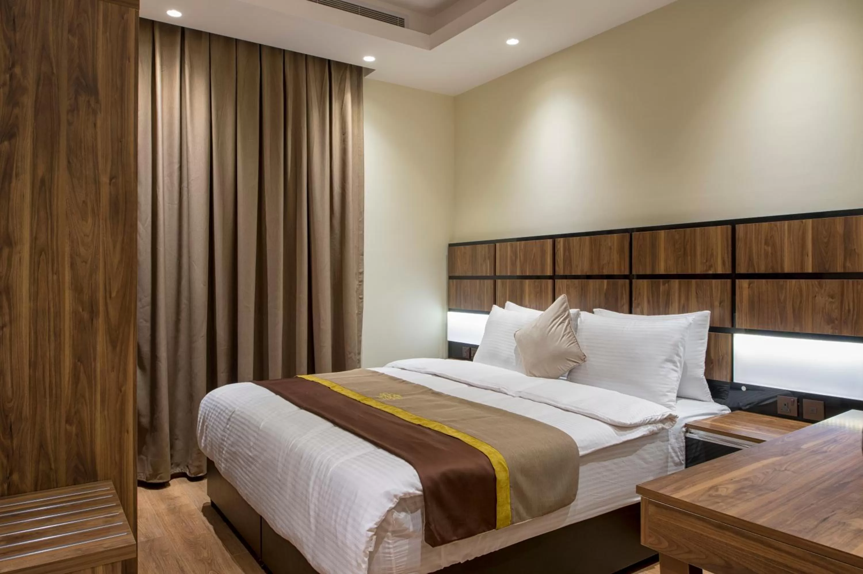 Bed in Classical Hotel Suites