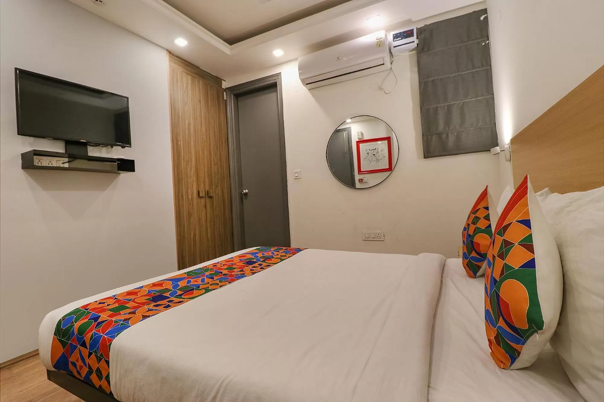 Photo of the whole room, Bed in FabHotel The Chaitanyas Rohini sec 18