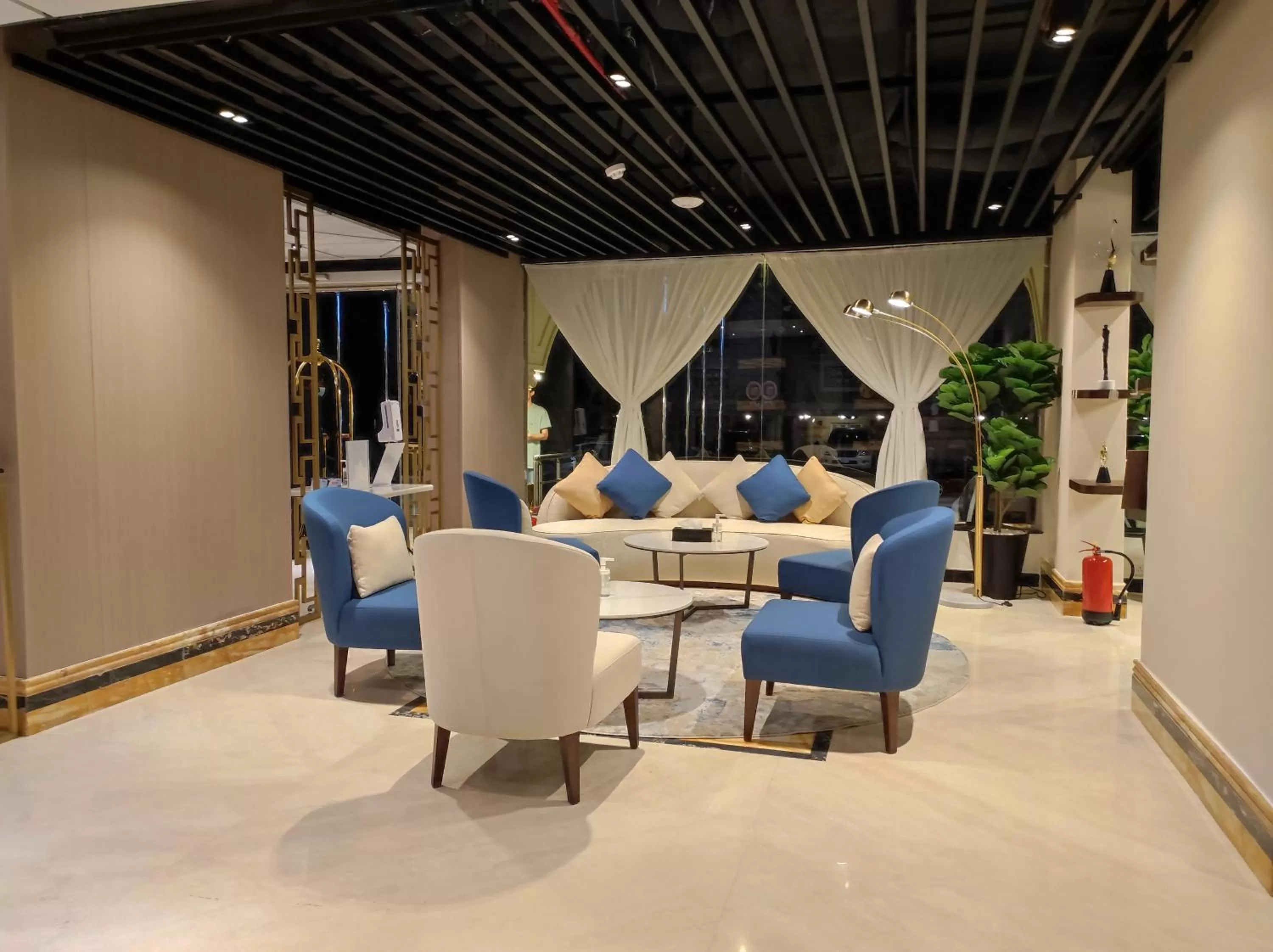 Lobby or reception in Aquila Al Hamra Hotel