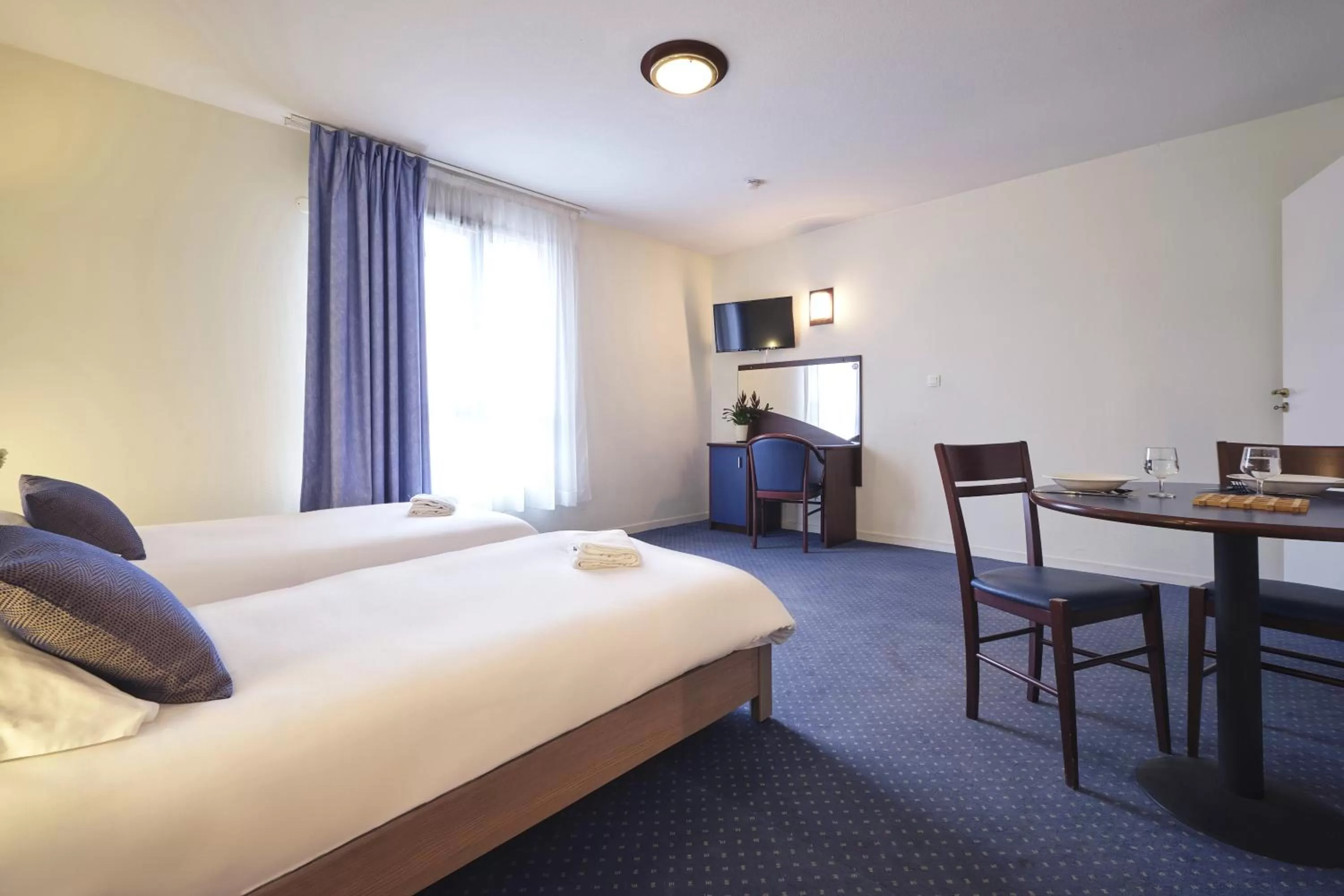 Photo of the whole room in Zenitude Hôtel-Résidences Carcassonne