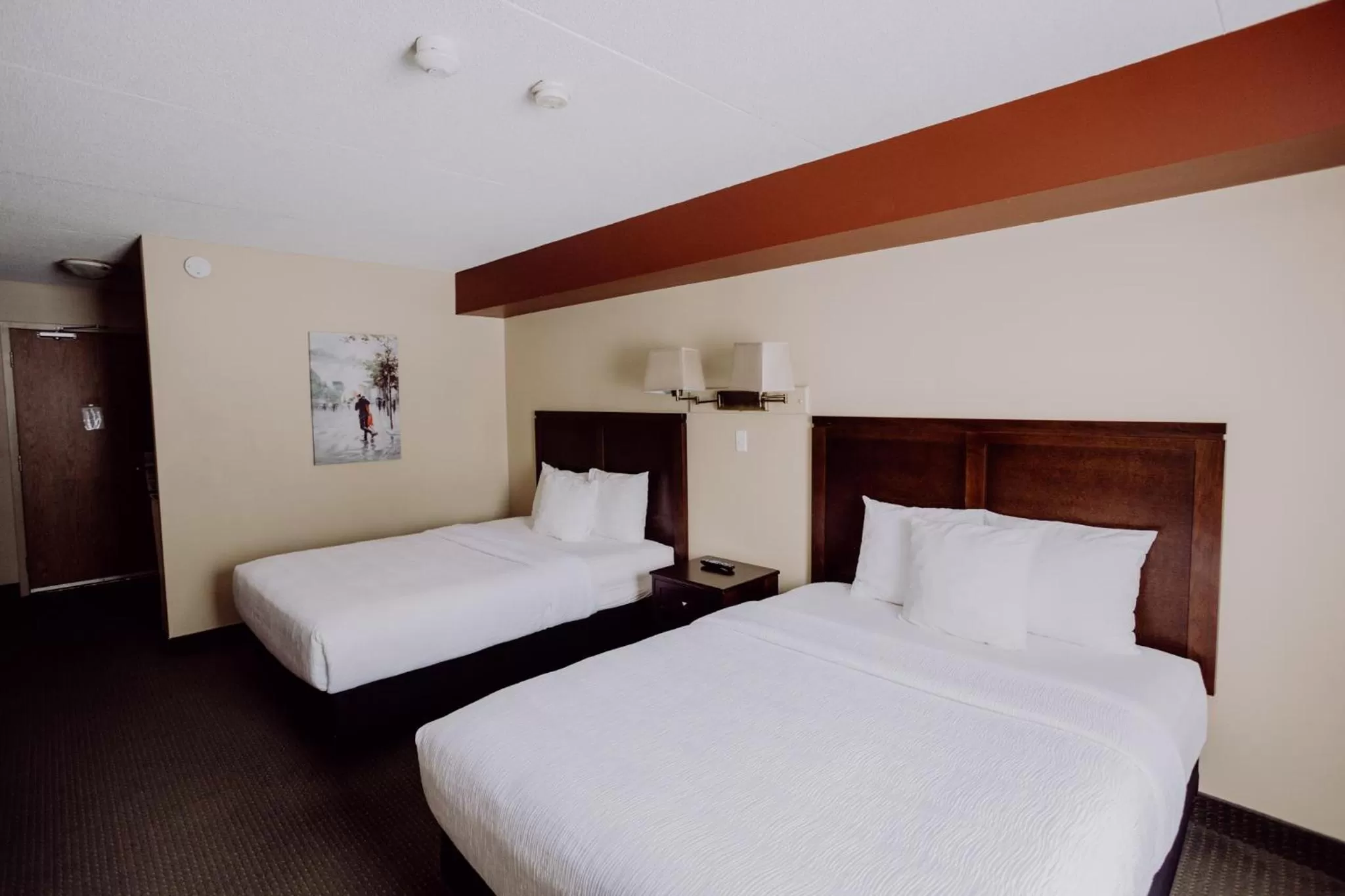 Queen Room with Two Queen Beds - single occupancy in La Place Rendez-Vous Hotel