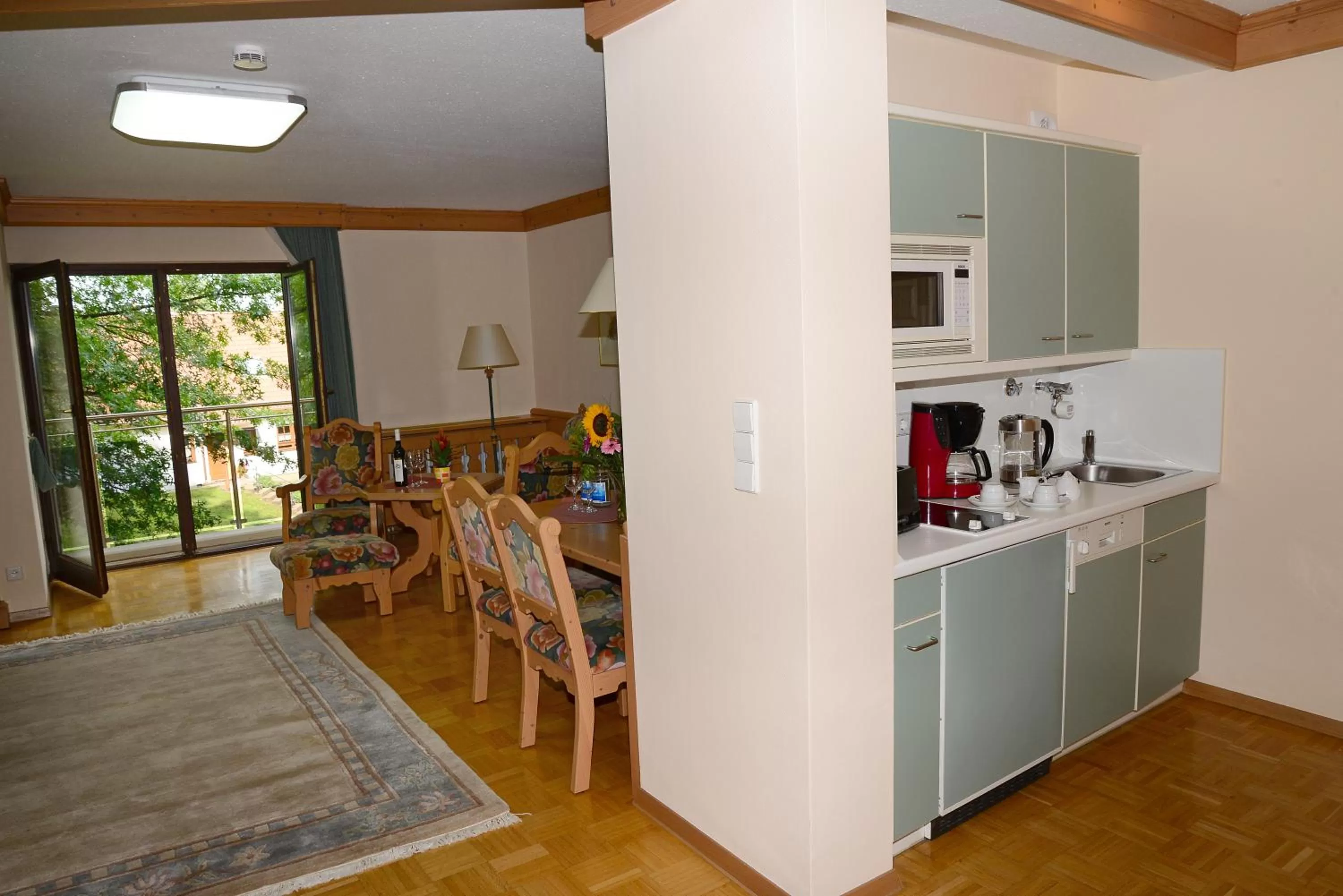 Kitchen or kitchenette in Residence am Weinberg / Travellers Hotelbetriebs GmbH