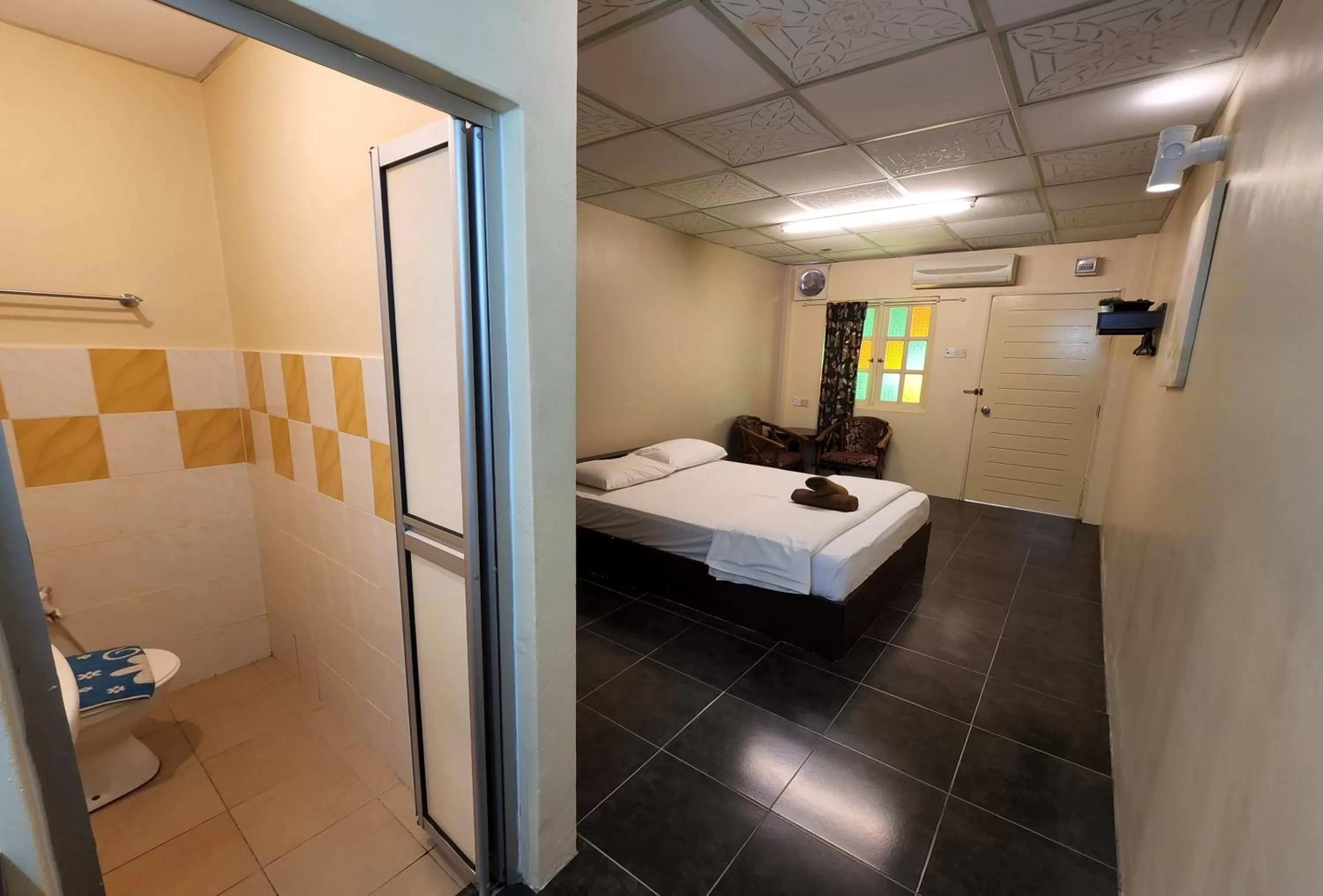 Bed, Bathroom in Sabak Awor Resort