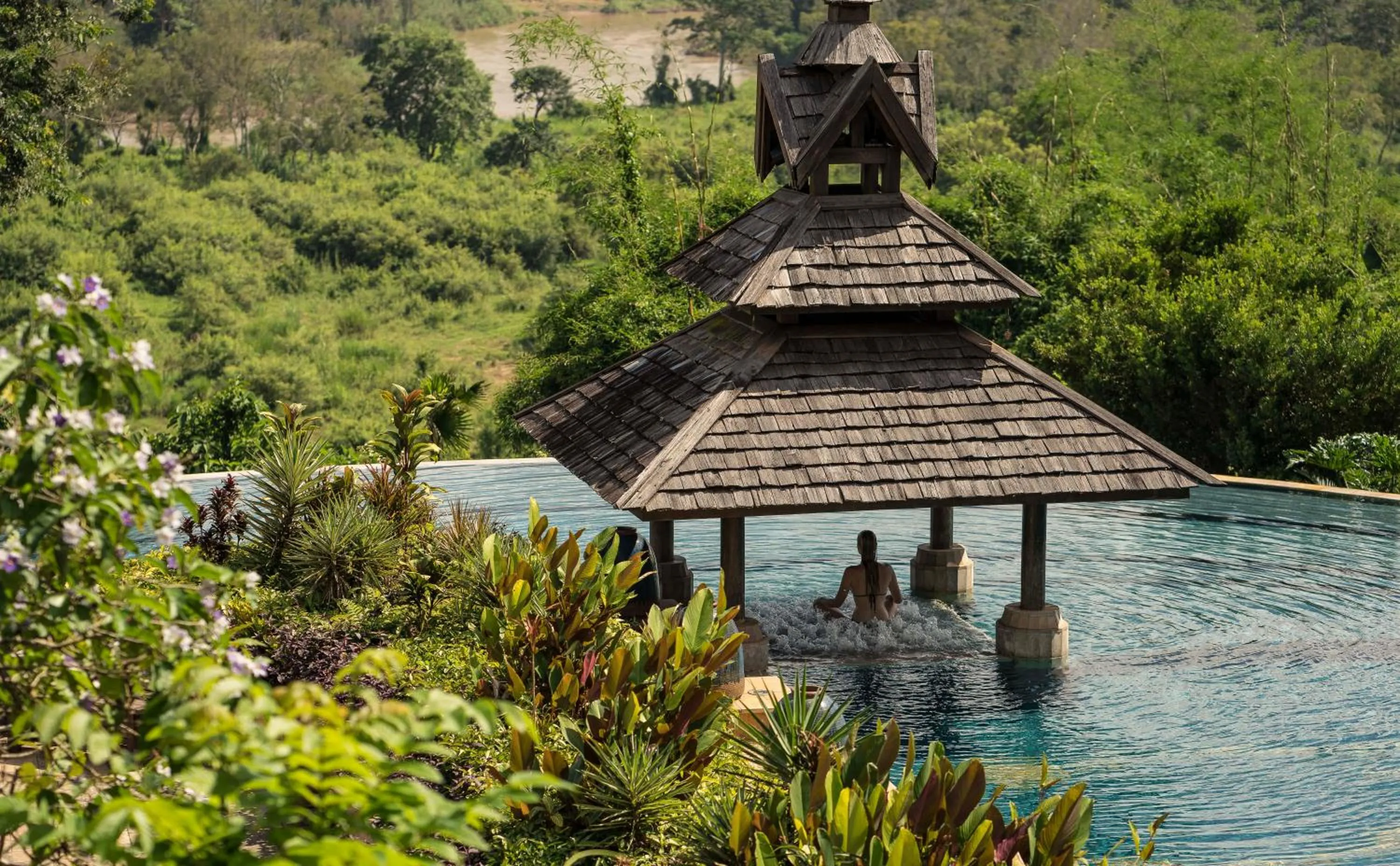 Swimming pool in Anantara Golden Triangle Elephant Camp & Resort