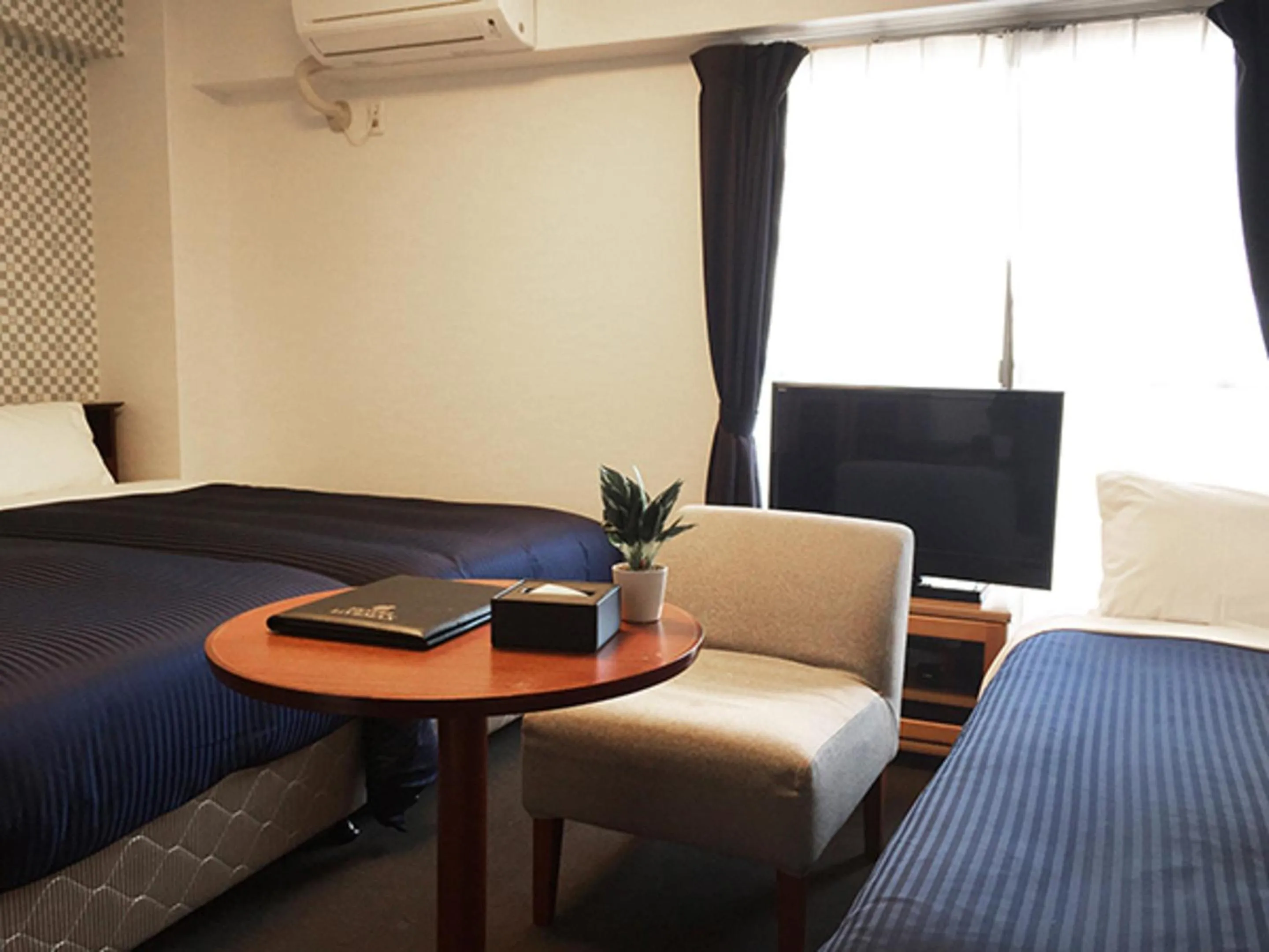 Bed in HOTEL LiVEMAX BUDGET Fuchu