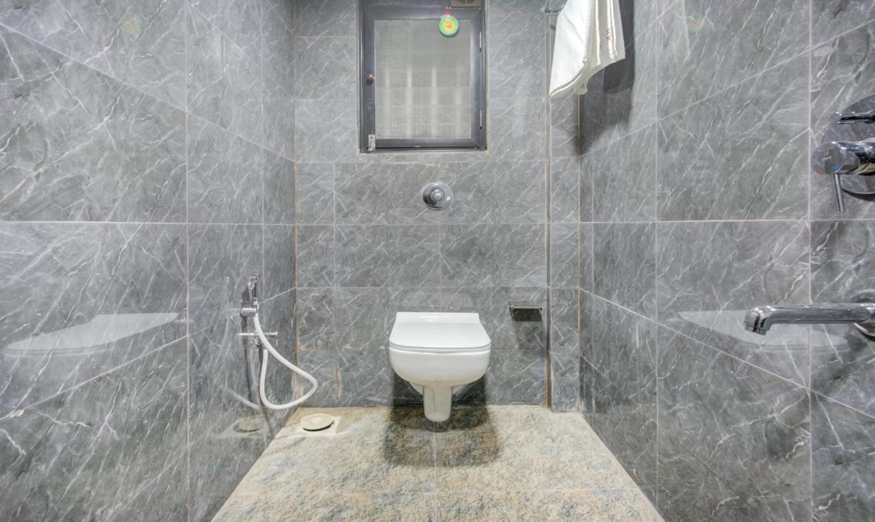 Toilet in Treebo Kings Inn Vashi